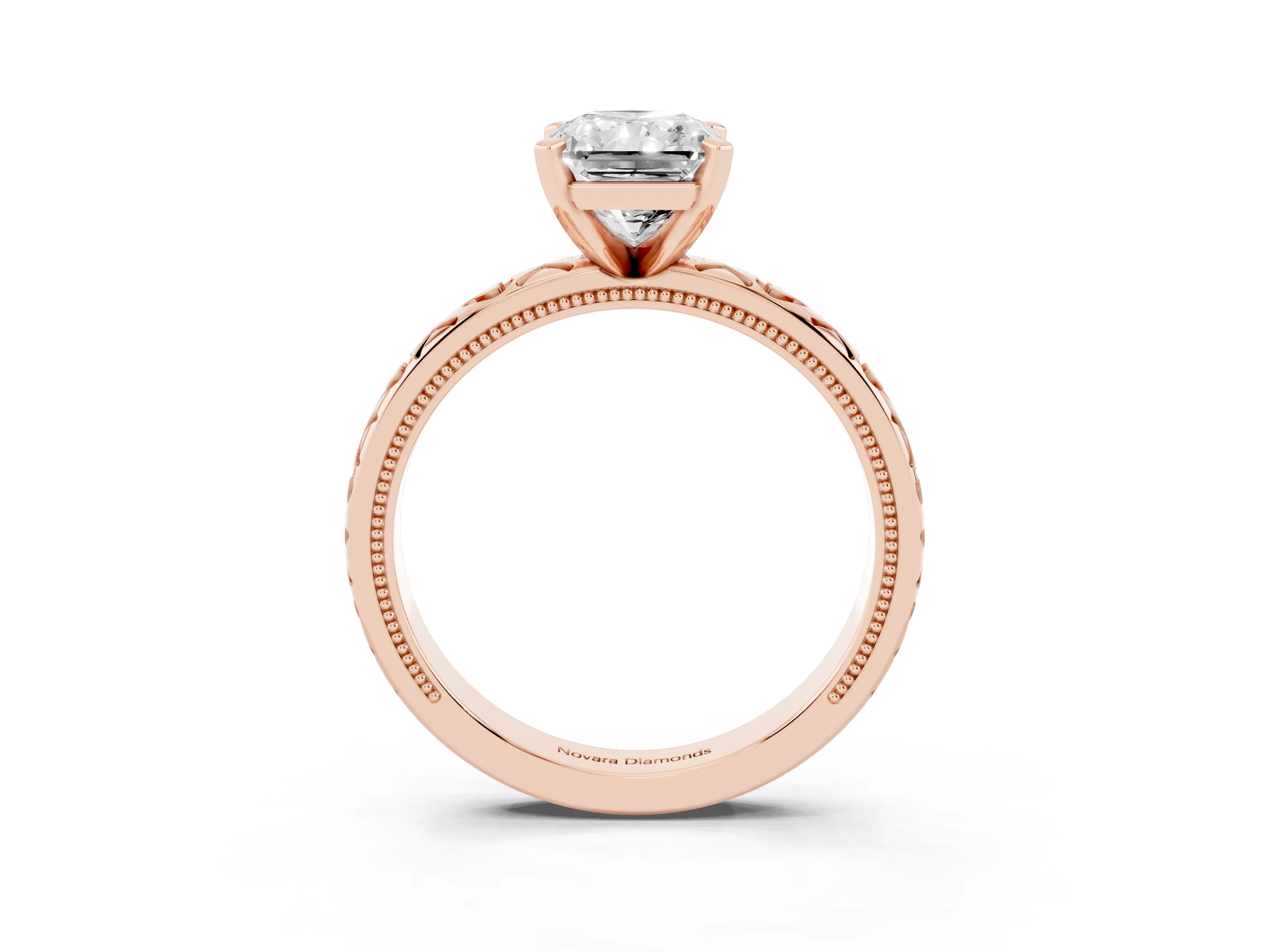 Radiant Cut Diamond Solitaire Engagement Ring Set in Rose gold with XO Engraved Band and Prong Setting
