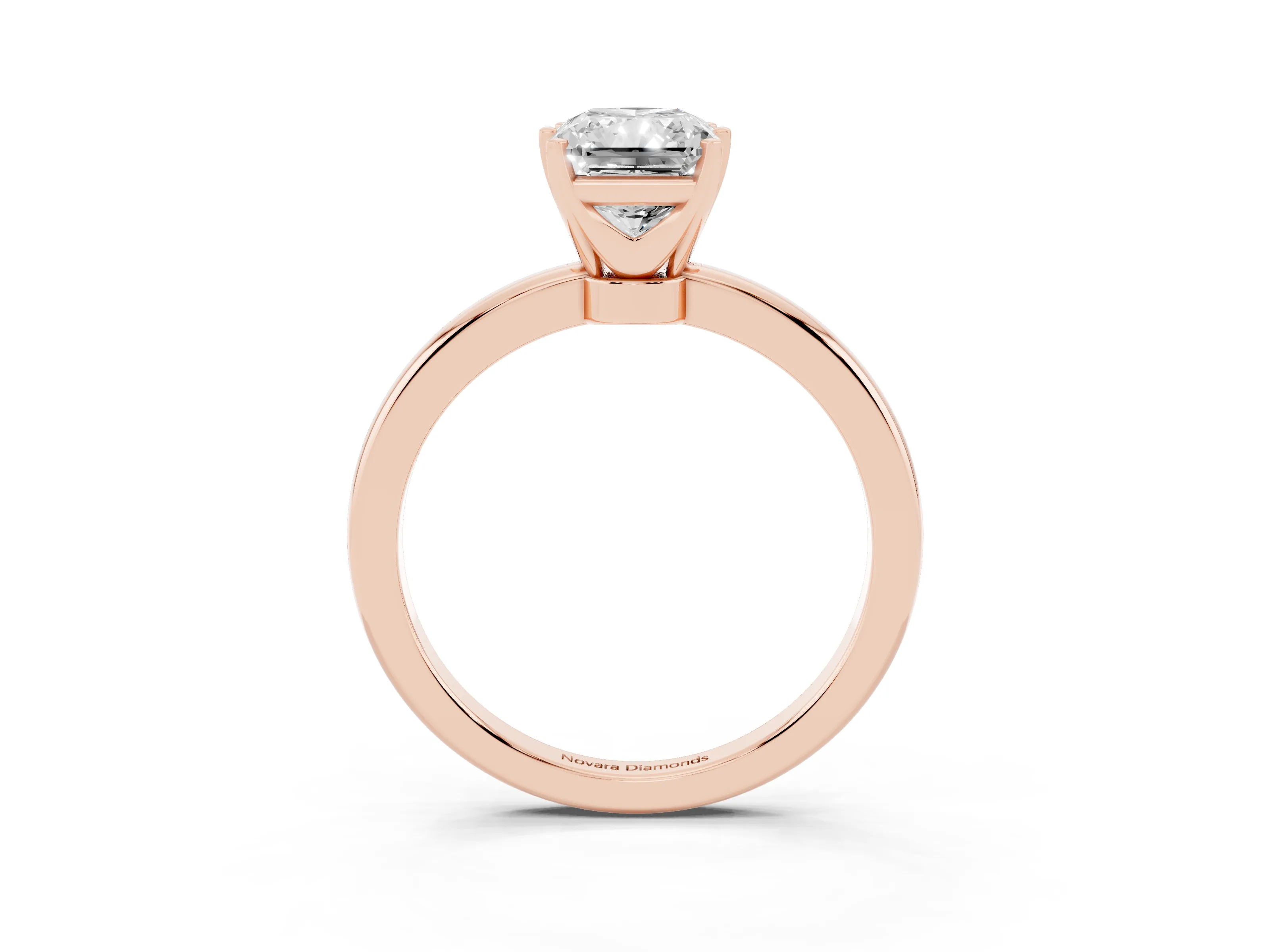 Radiant Cut Diamond Solitaire Ring Set in Rose gold with Raised Prong Setting on a Classic Band