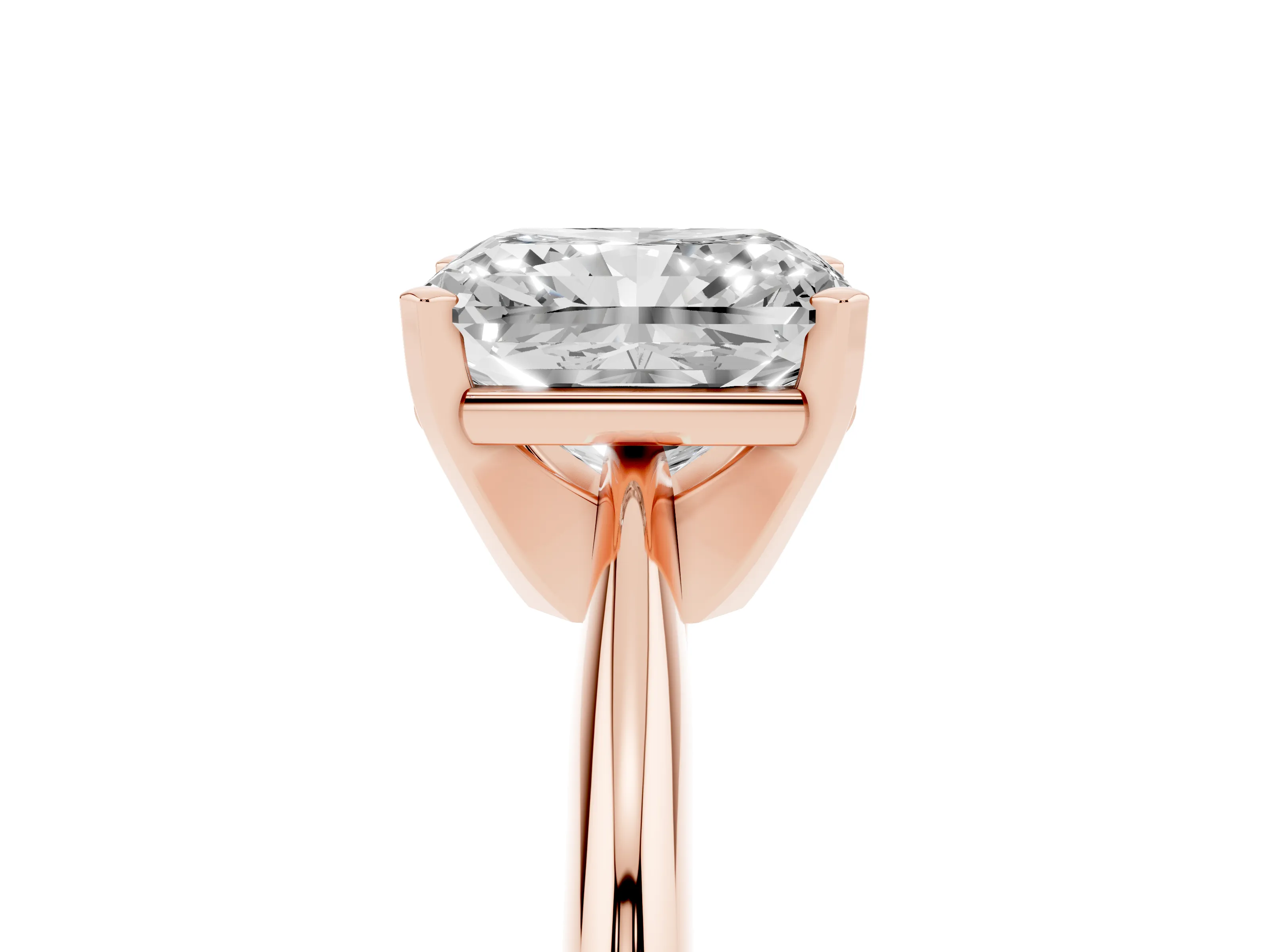 Radiant Cut Diamond Solitaire Ring Set in Rose gold with Prong Setting on a Plain Round Band
