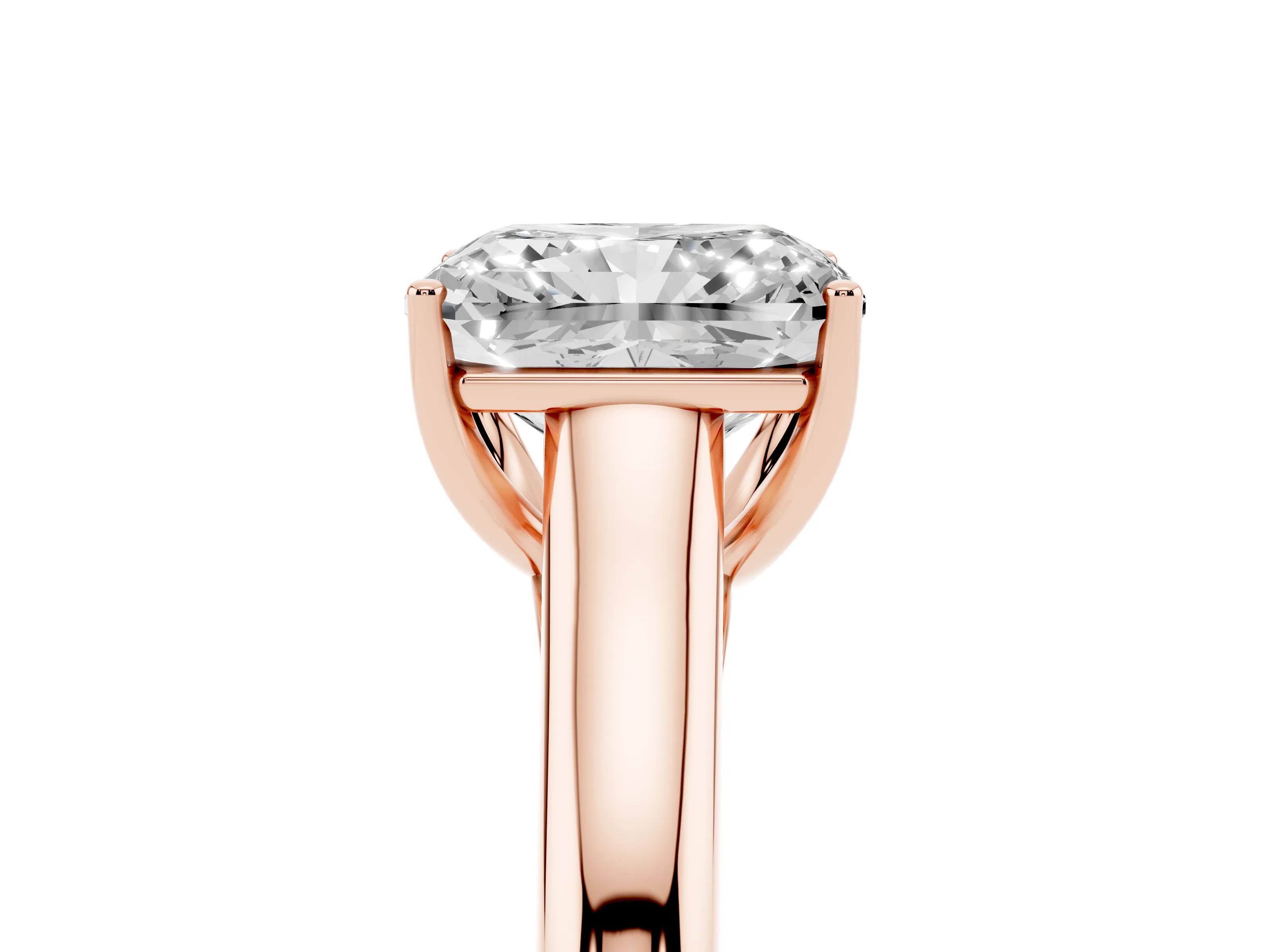 Radiant Cut Diamond Solitaire Engagement Ring Set in Rose gold with Subtly Tapered Band and Prong Setting