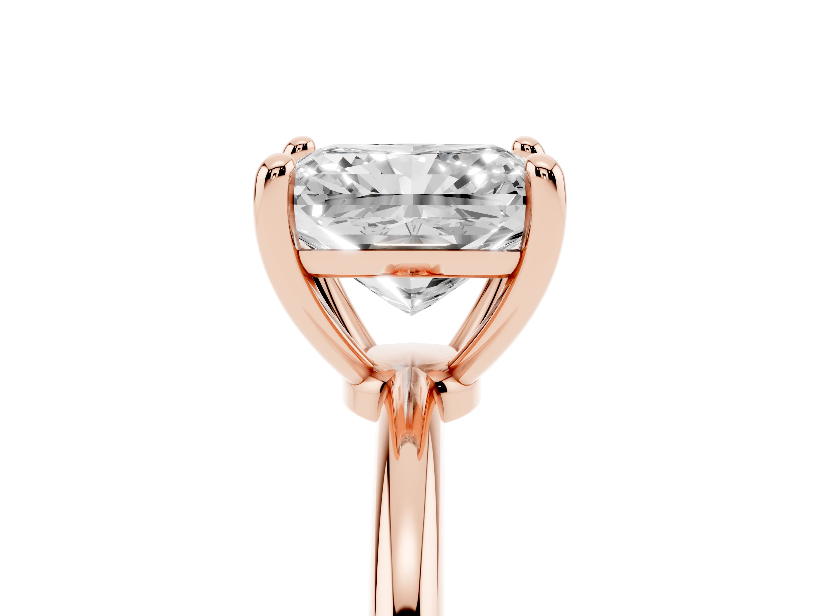 Radiant Cut Diamond Solitaire Ring Set in Rose gold with Secure Prong Setting on a Classic Band