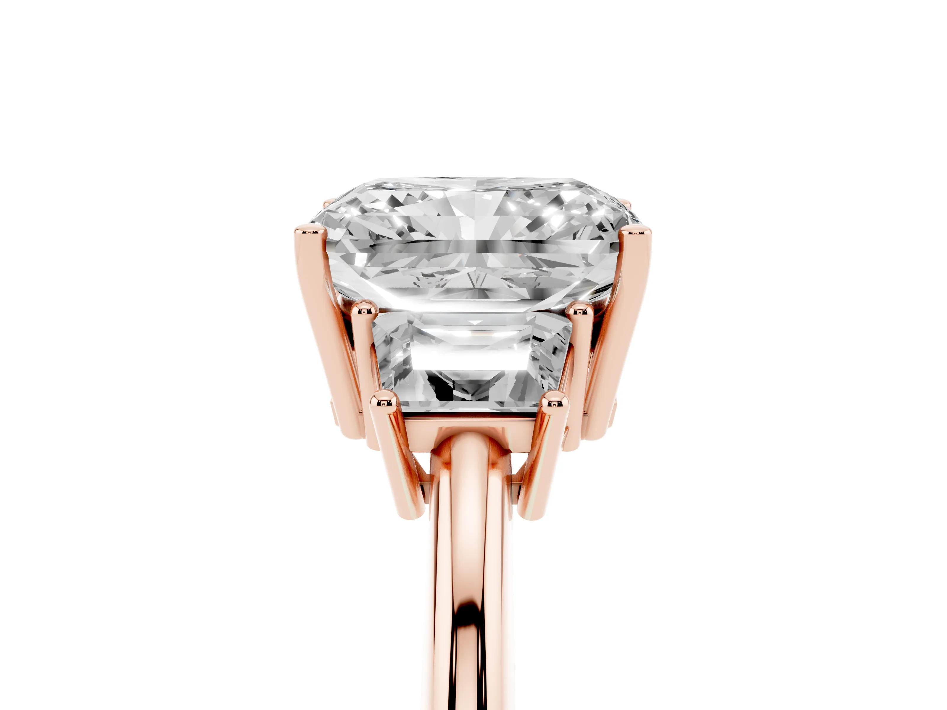 Radiant Cut Diamond Three-Stone Ring Set in Rose gold with Trapezoid Side Stones and Prong Setting