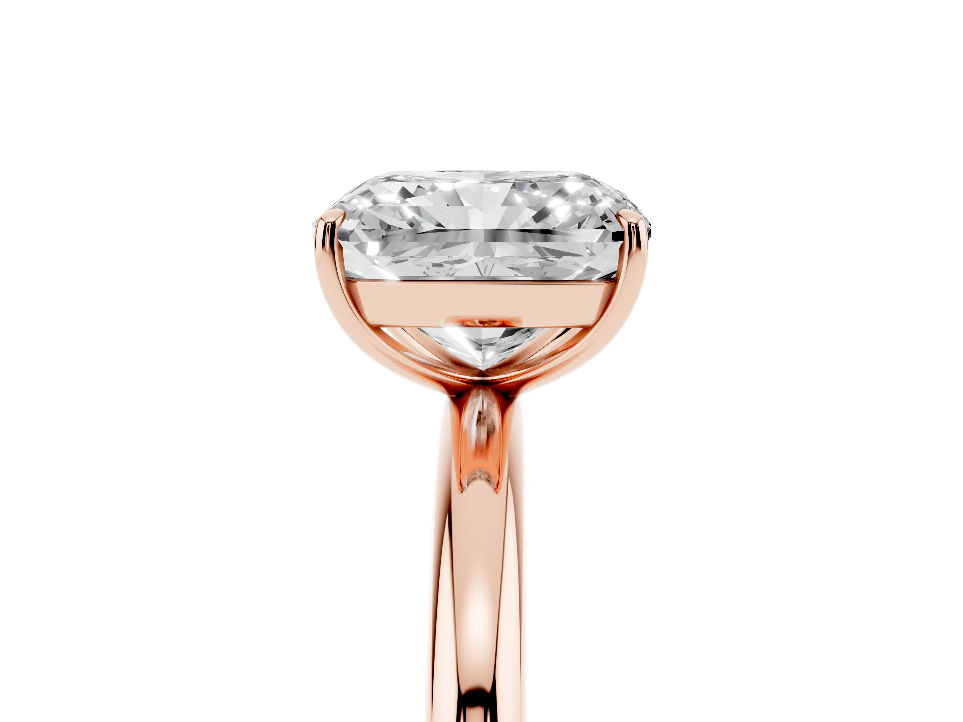 Radiant Cut Diamond Solitaire Ring Set in Rose gold with Prong Setting on a Polished Plain Band