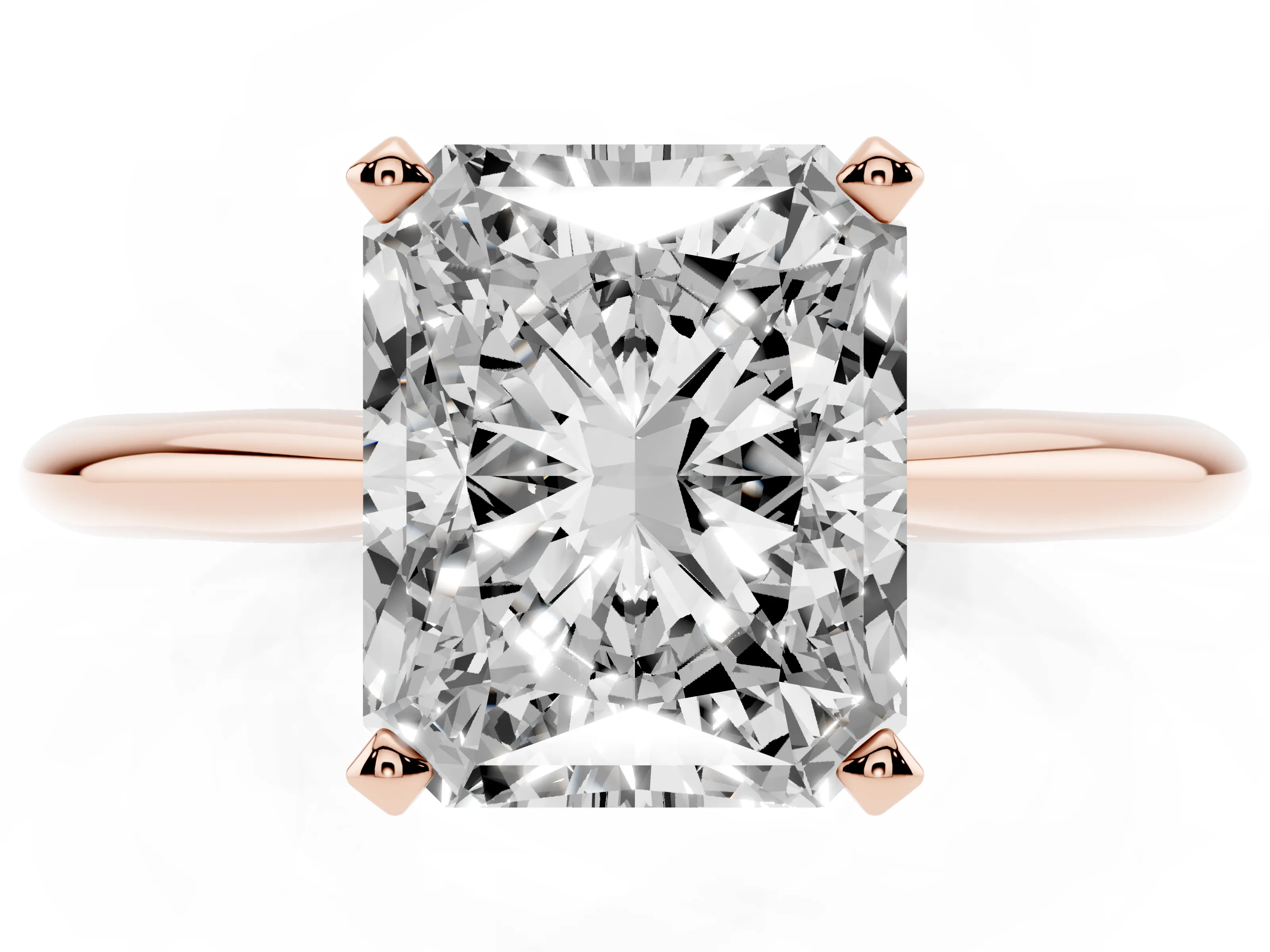 Radiant Cut Diamond Solitaire Ring Set in Rose gold with Prong Setting on a Plain Round Band