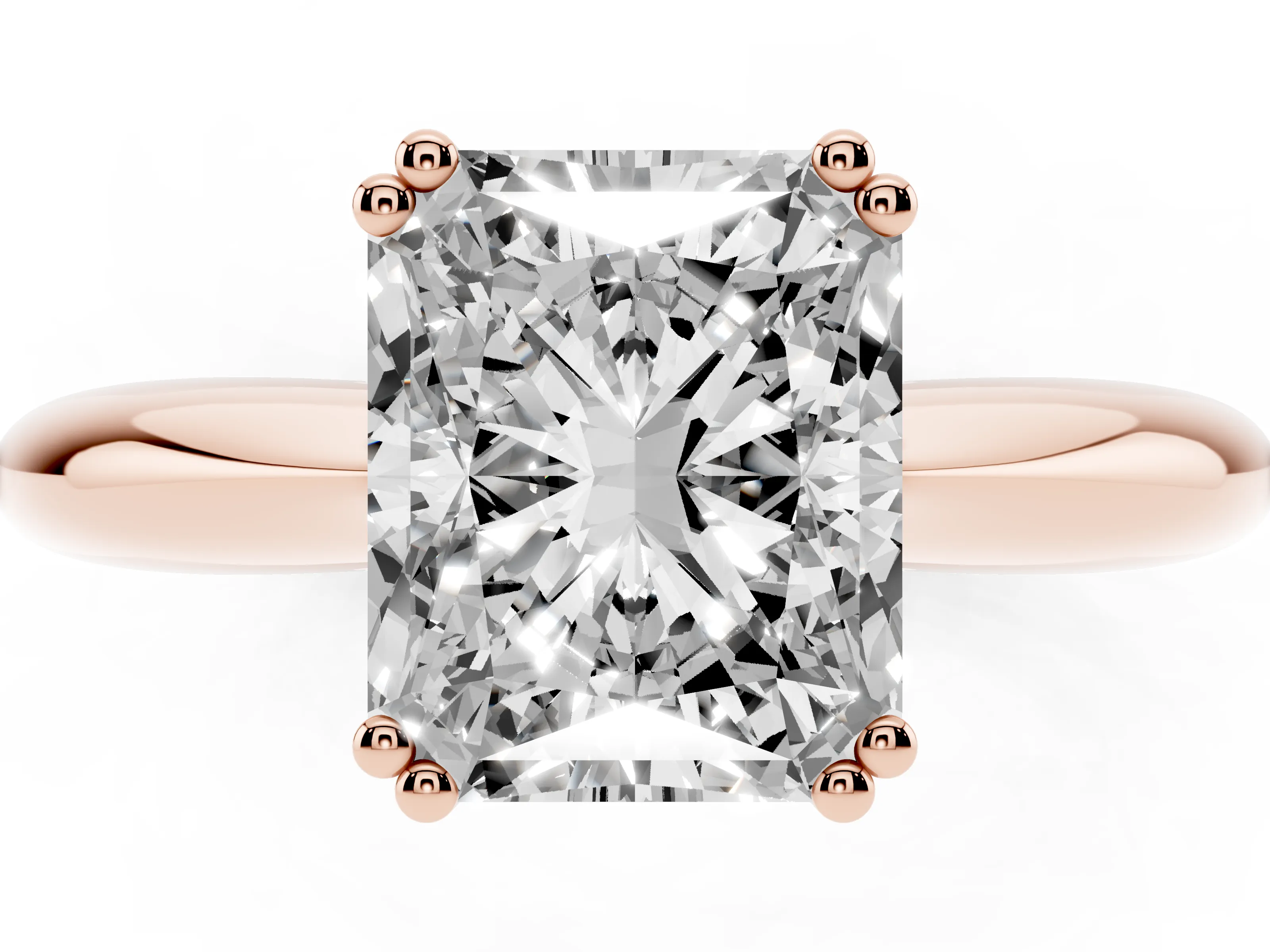 Radiant Cut Diamond Solitaire Engagement Ring Set in Rose gold with Tapered Band and Prong Setting
