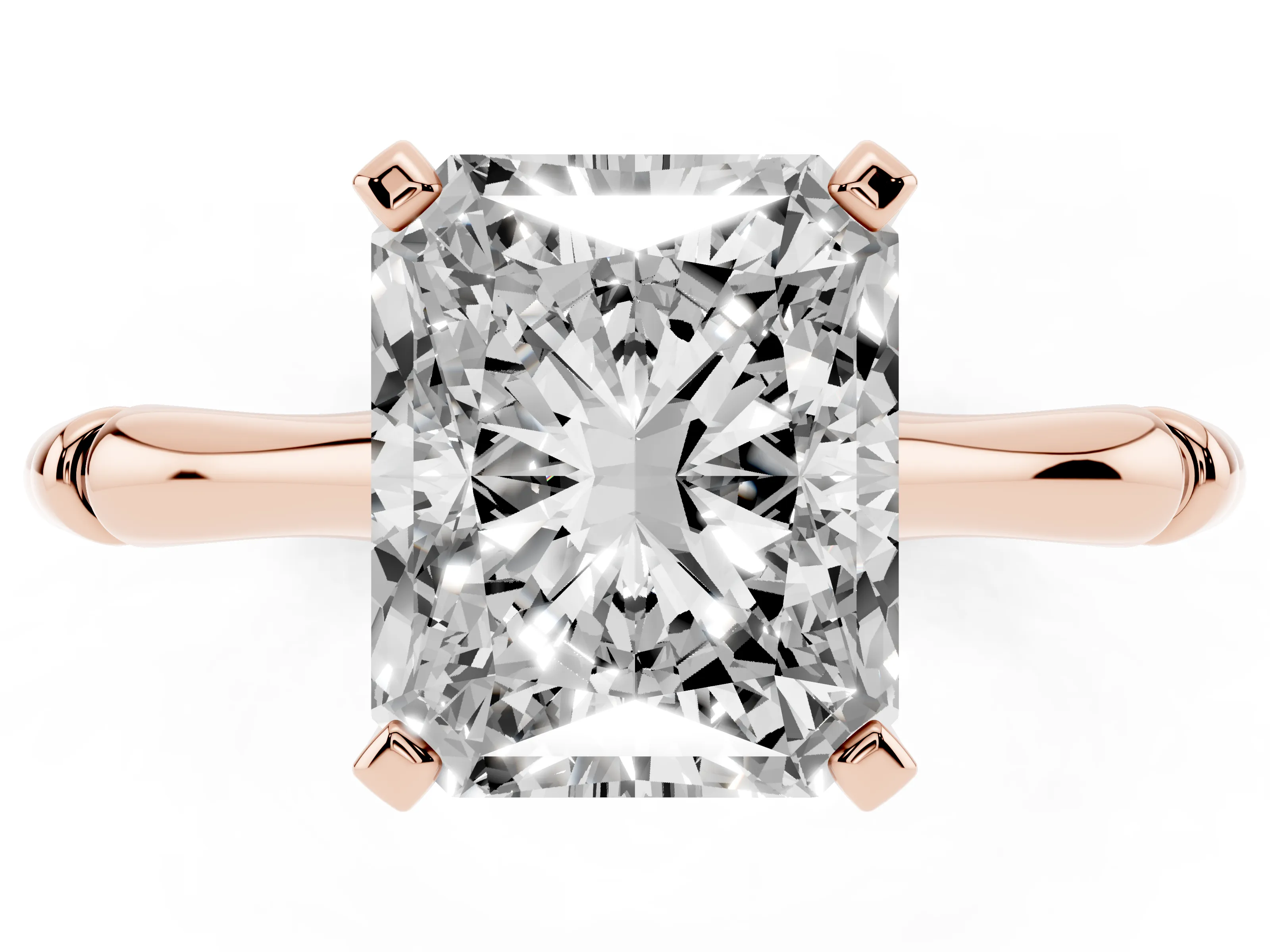 Radiant Cut Diamond Solitaire Ring Set in Rose gold with Bamboo Band and Prong Setting