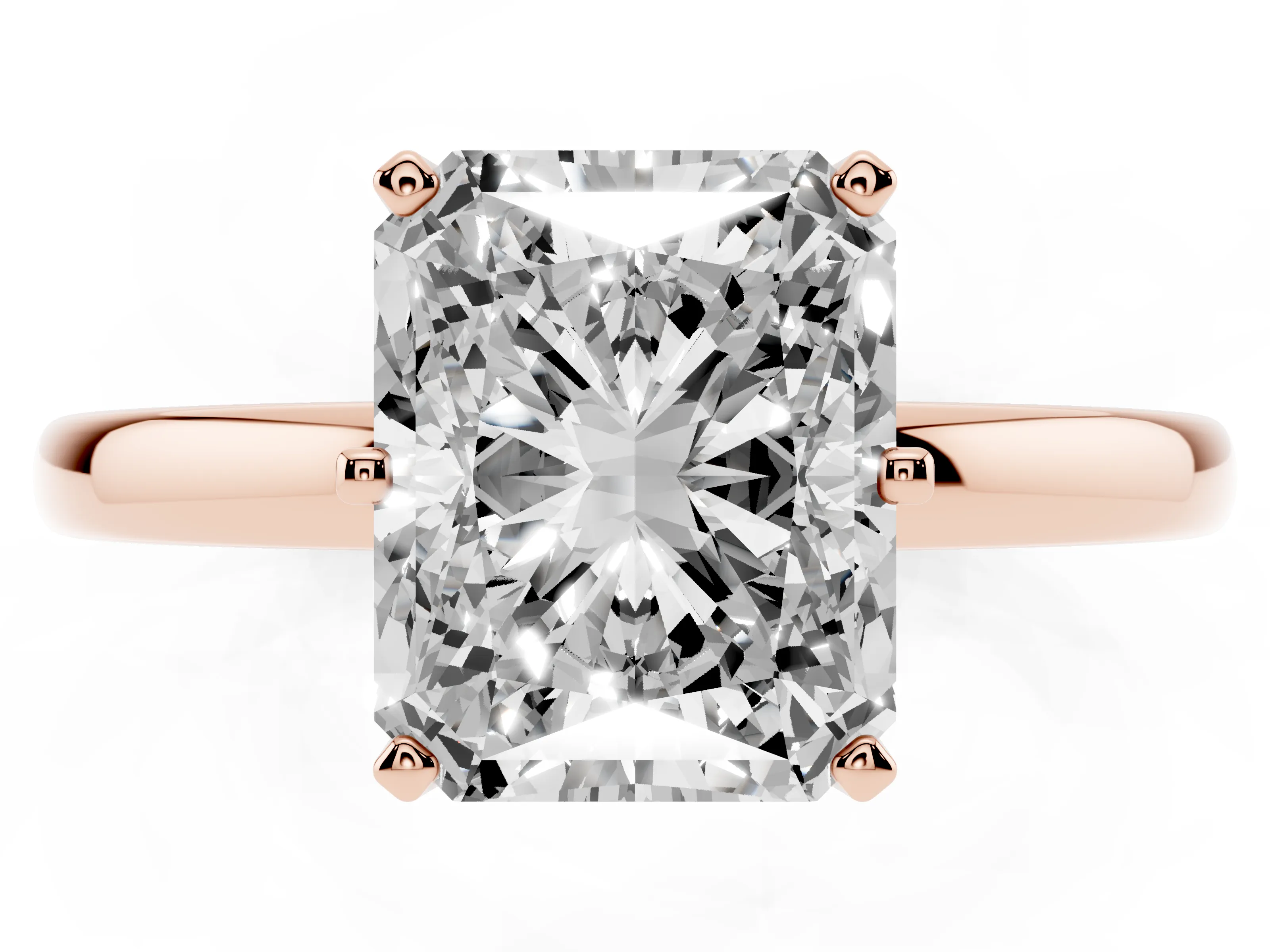 Radiant Cut Diamond Solitaire Ring Set in Rose gold with Raised Prong Setting on a Classic Band