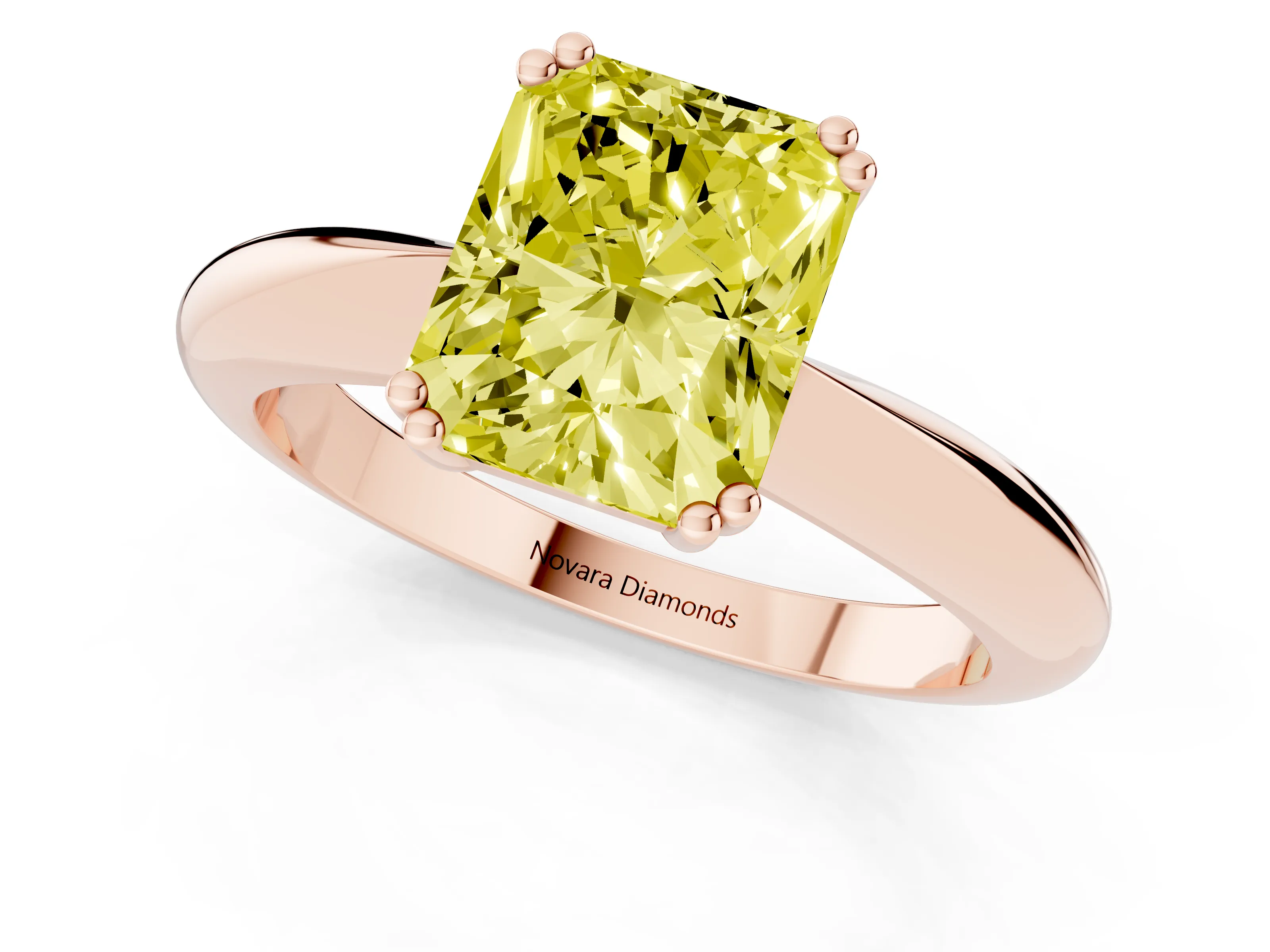 Fancy Yellow Radiant Cut Diamond Solitaire Engagement Ring Set in Rose gold with Tapered Band and Prong Setting
