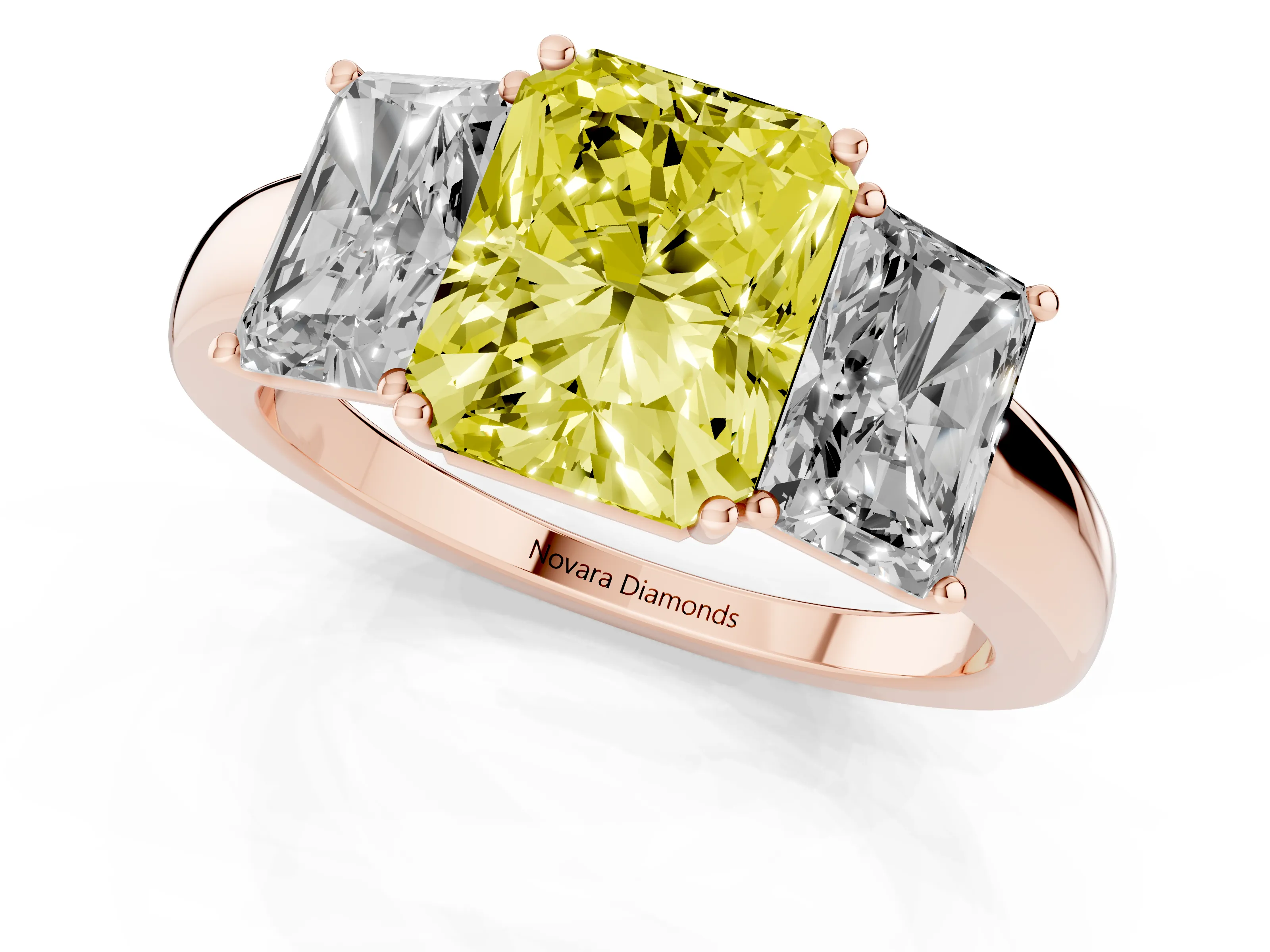 Fancy Yellow Radiant Cut Diamond Three-Stone Ring Set in Rose gold with Bold Center and Classic Band