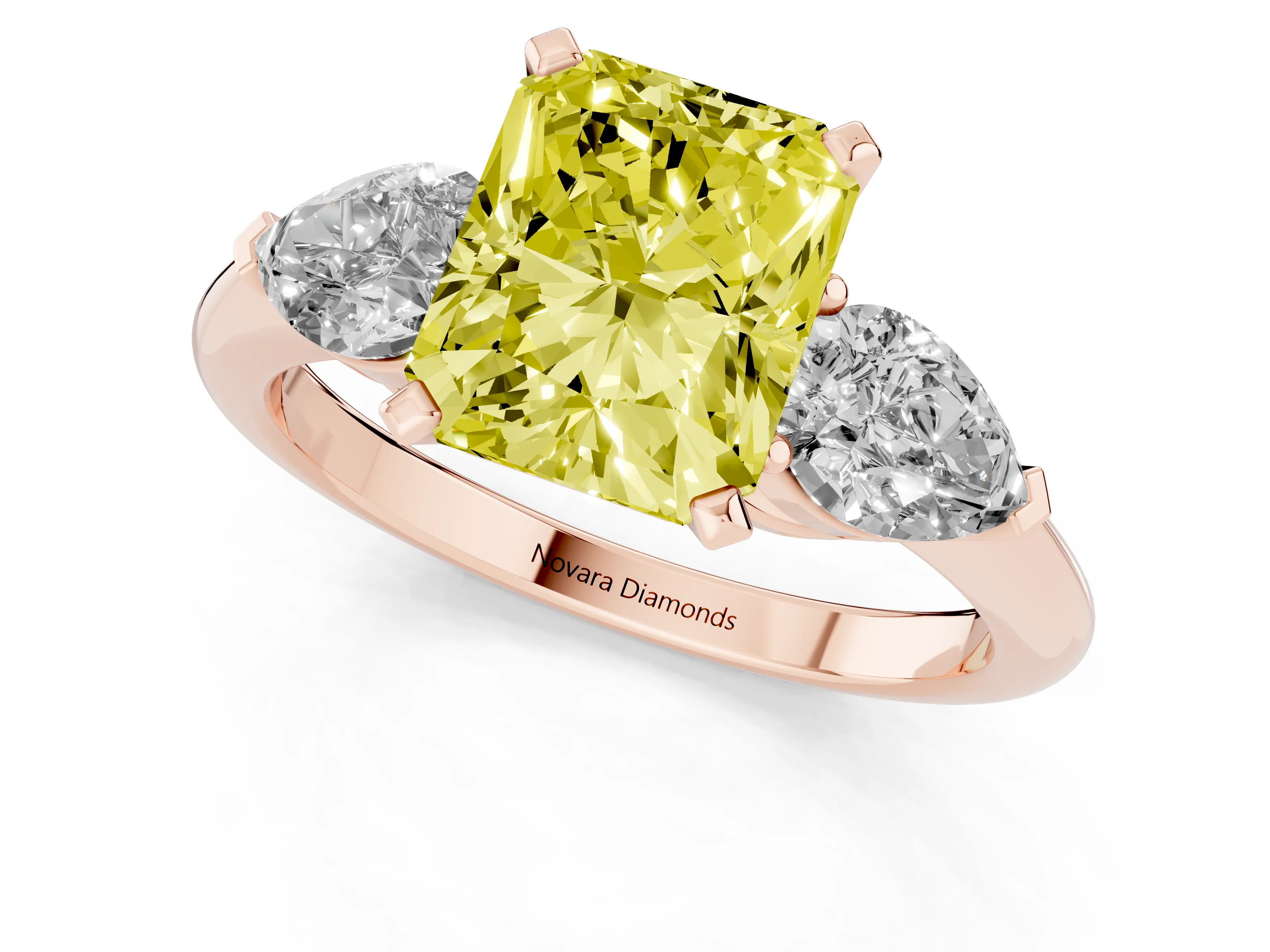 Fancy Yellow Three-Stone Radiant Cut Diamond Ring Set in Rose gold with Pear Side Stones and Prong Setting