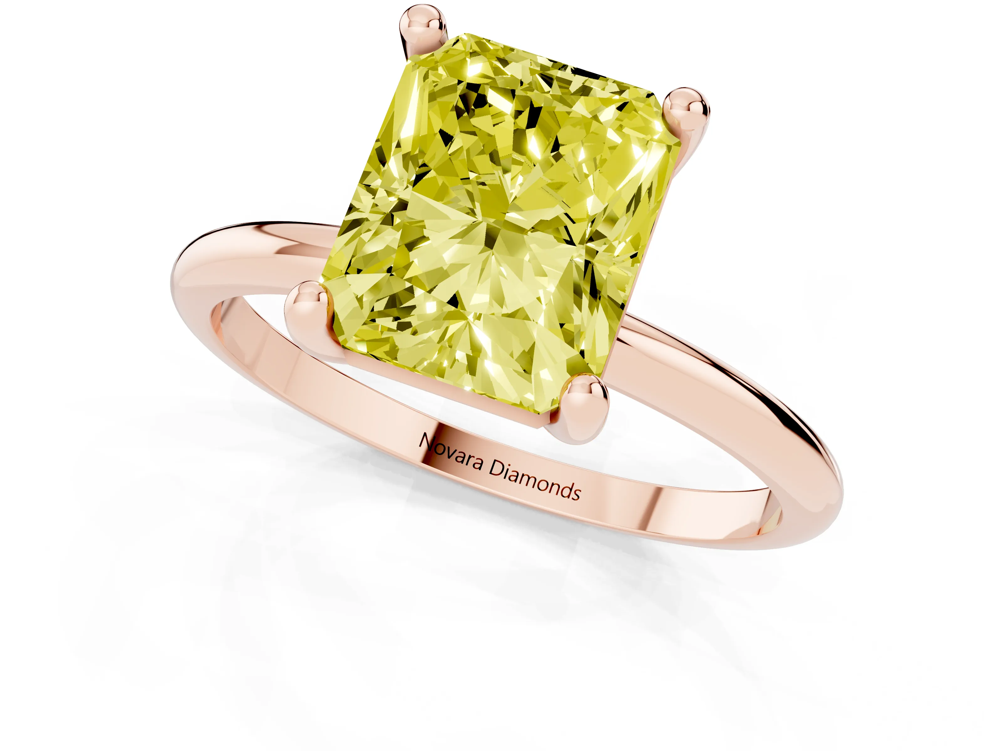 Fancy Yellow Radiant Cut Diamond Solitaire Ring Set in Rose gold with Secure Prong Setting on a Classic Band