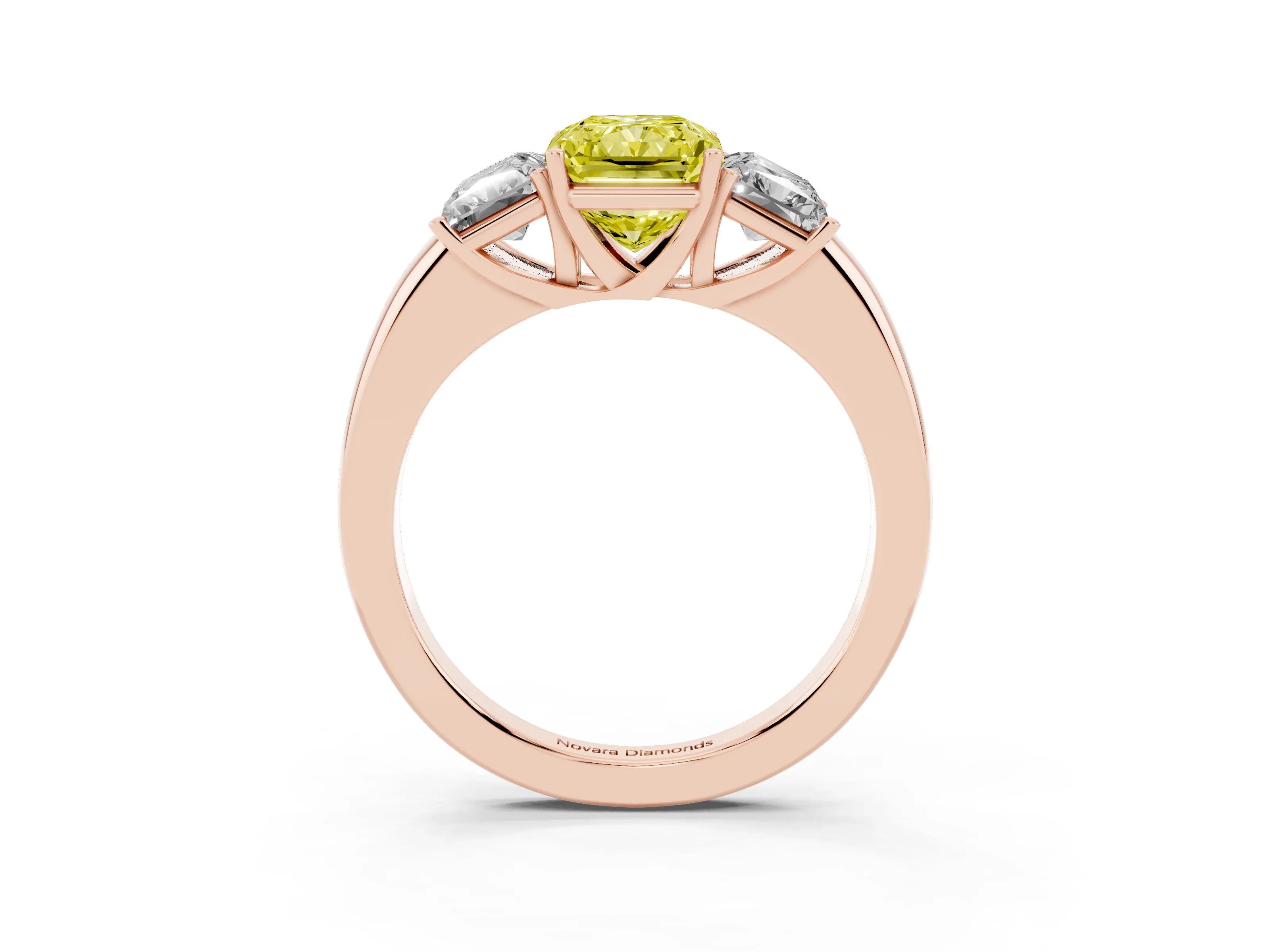 Fancy Yellow Radiant Cut Diamond Three-Stone Ring Set in Rose gold with Bold Center and Classic Band