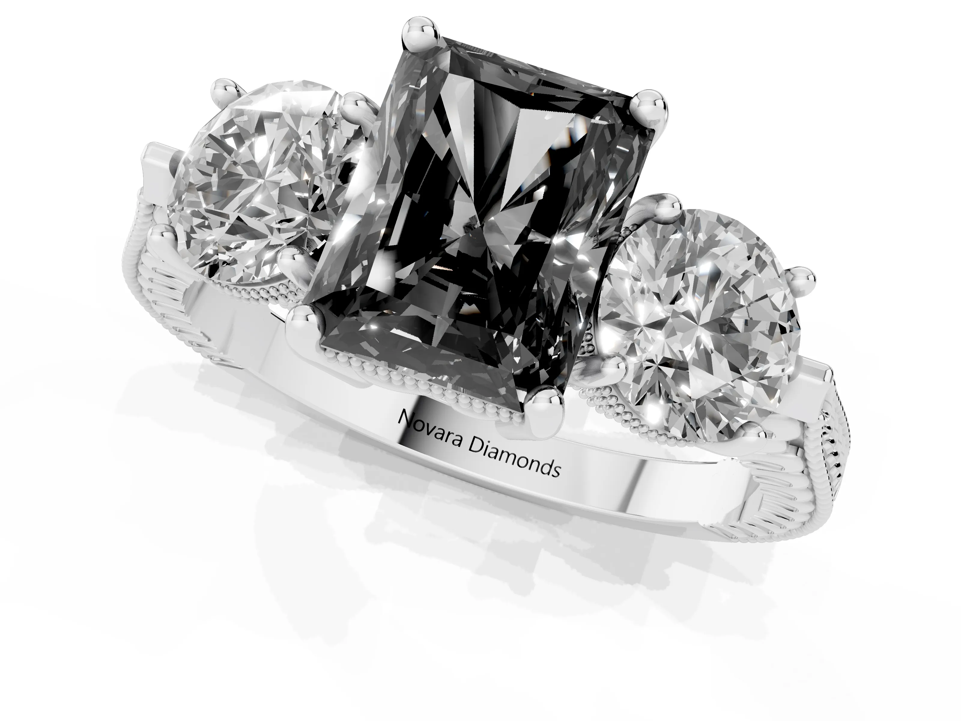 Fancy Black Radiant Cut Diamond Three-Stone Ring Set in White gold with Milgrain Band