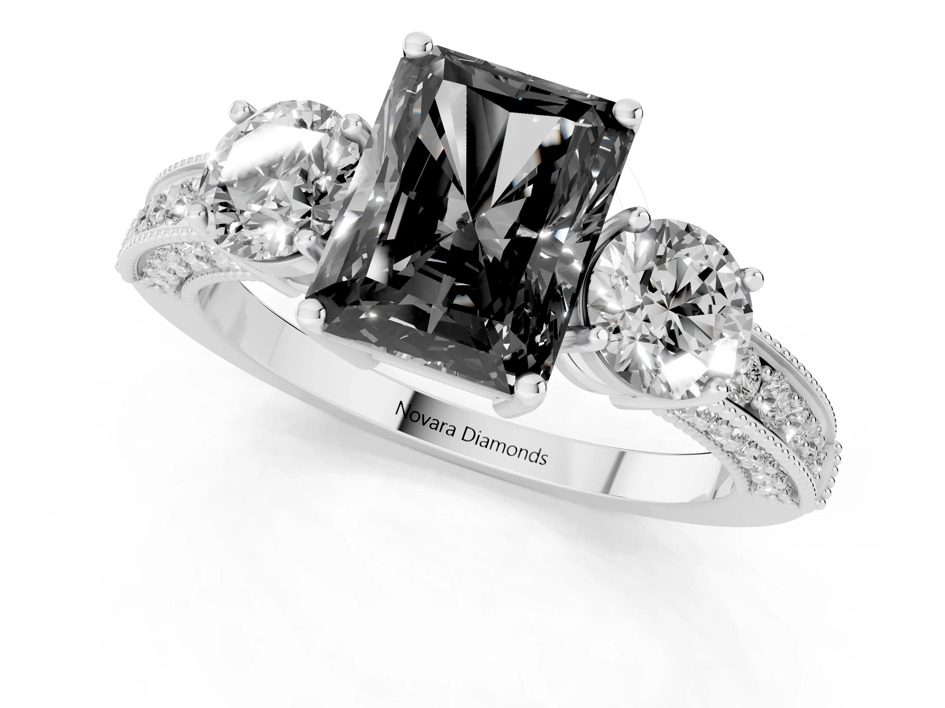 Fancy Black Radiant Cut Diamond Three-Stone Ring Set in Platinum with Round Side Stones and Pavé Band
