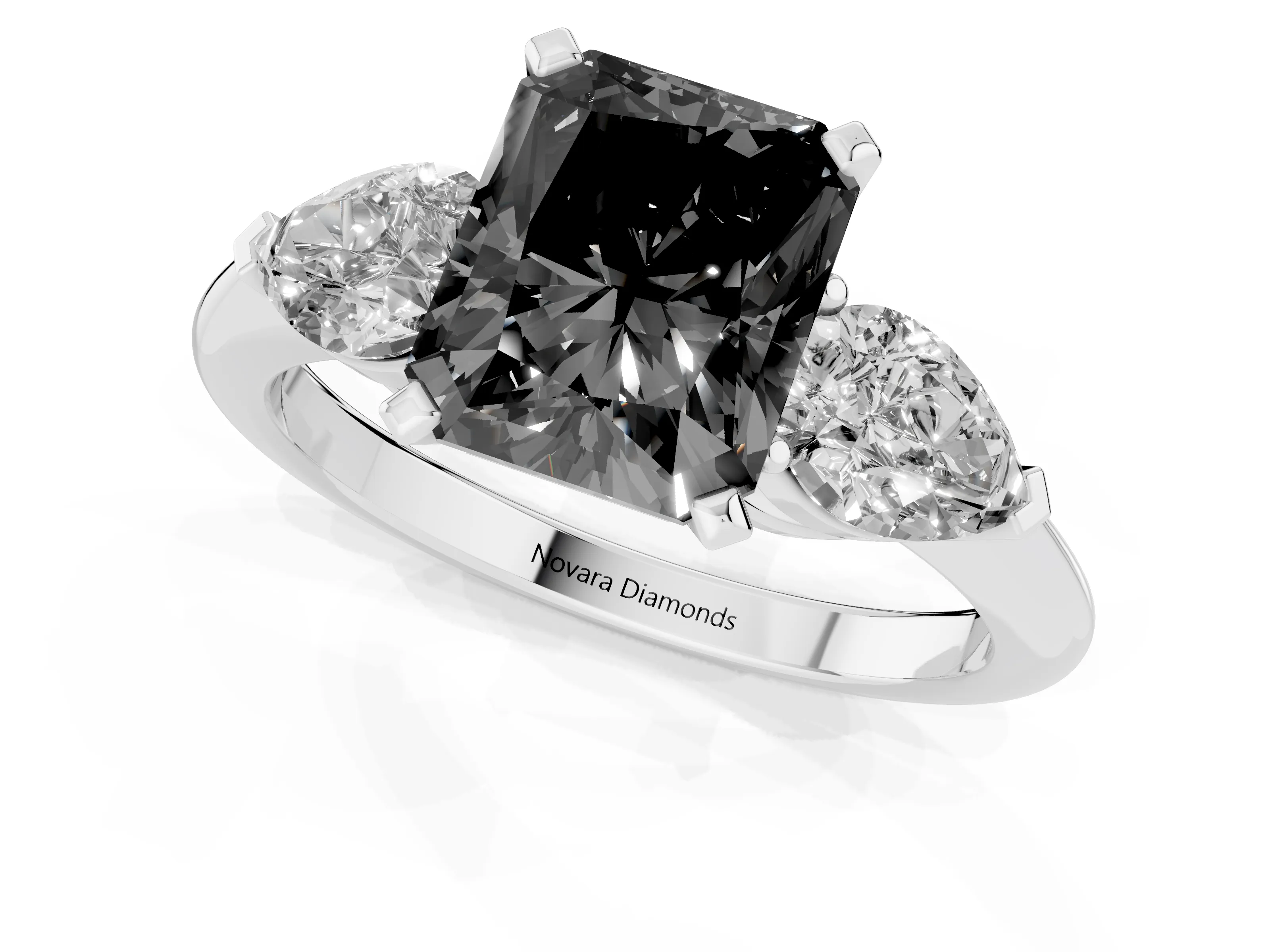 Fancy Black Three-Stone Radiant Cut Diamond Ring Set in White gold with Pear Side Stones and Prong Setting