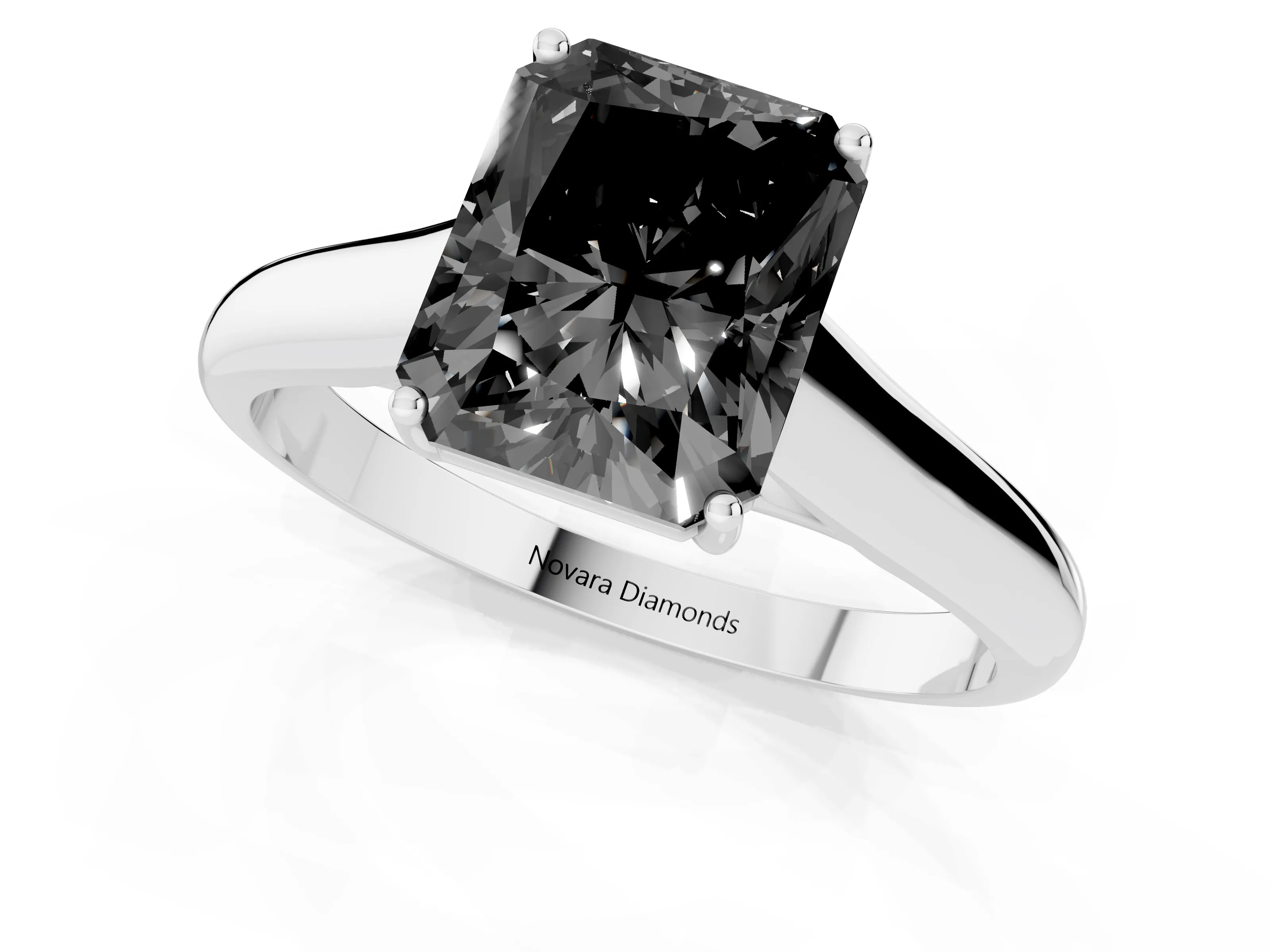 Fancy Black Radiant Cut Diamond Solitaire Engagement Ring Set in White gold with Subtly Tapered Band and Prong Setting