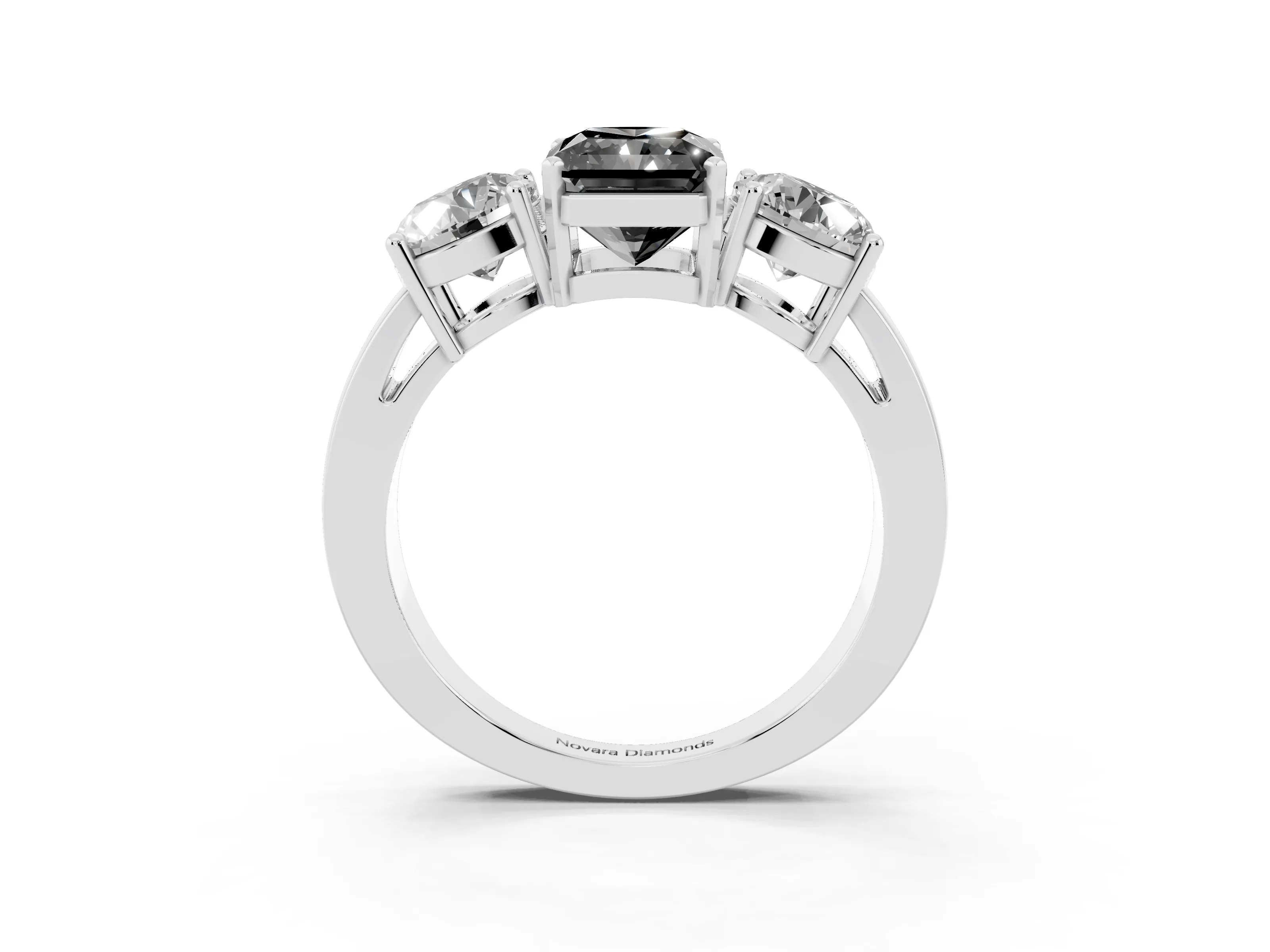 Fancy Black Radiant Cut Diamond Three-Stone Ring Set in Silver with Round Side Stones and Classic Band