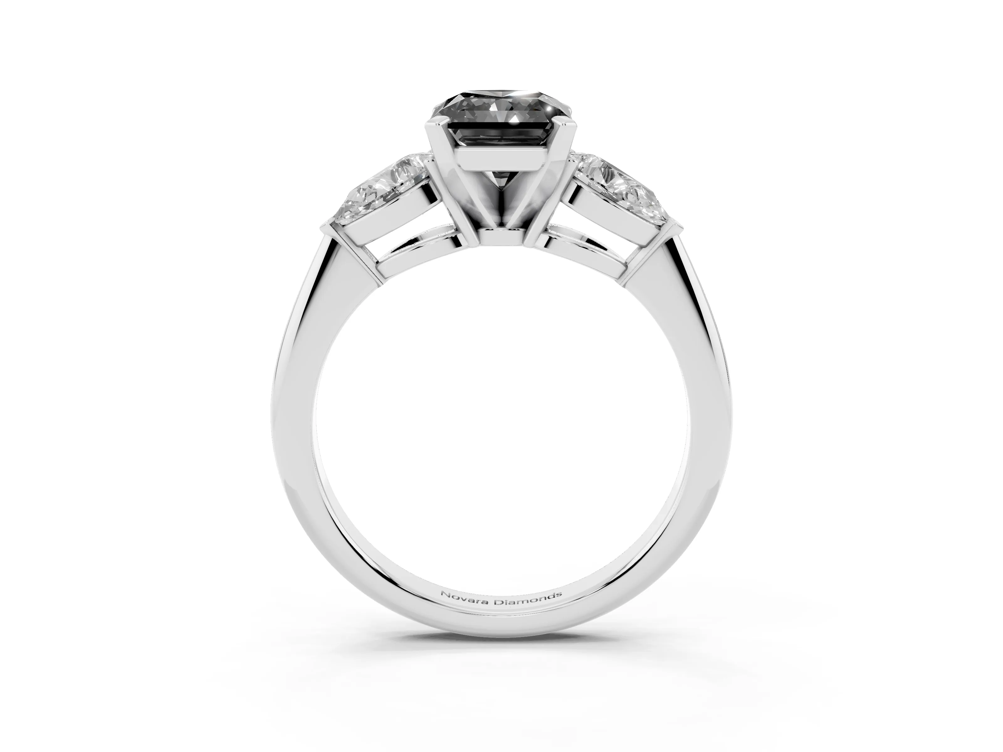 Fancy Black Three-Stone Radiant Cut Diamond Ring Set in White gold with Pear Side Stones and Prong Setting