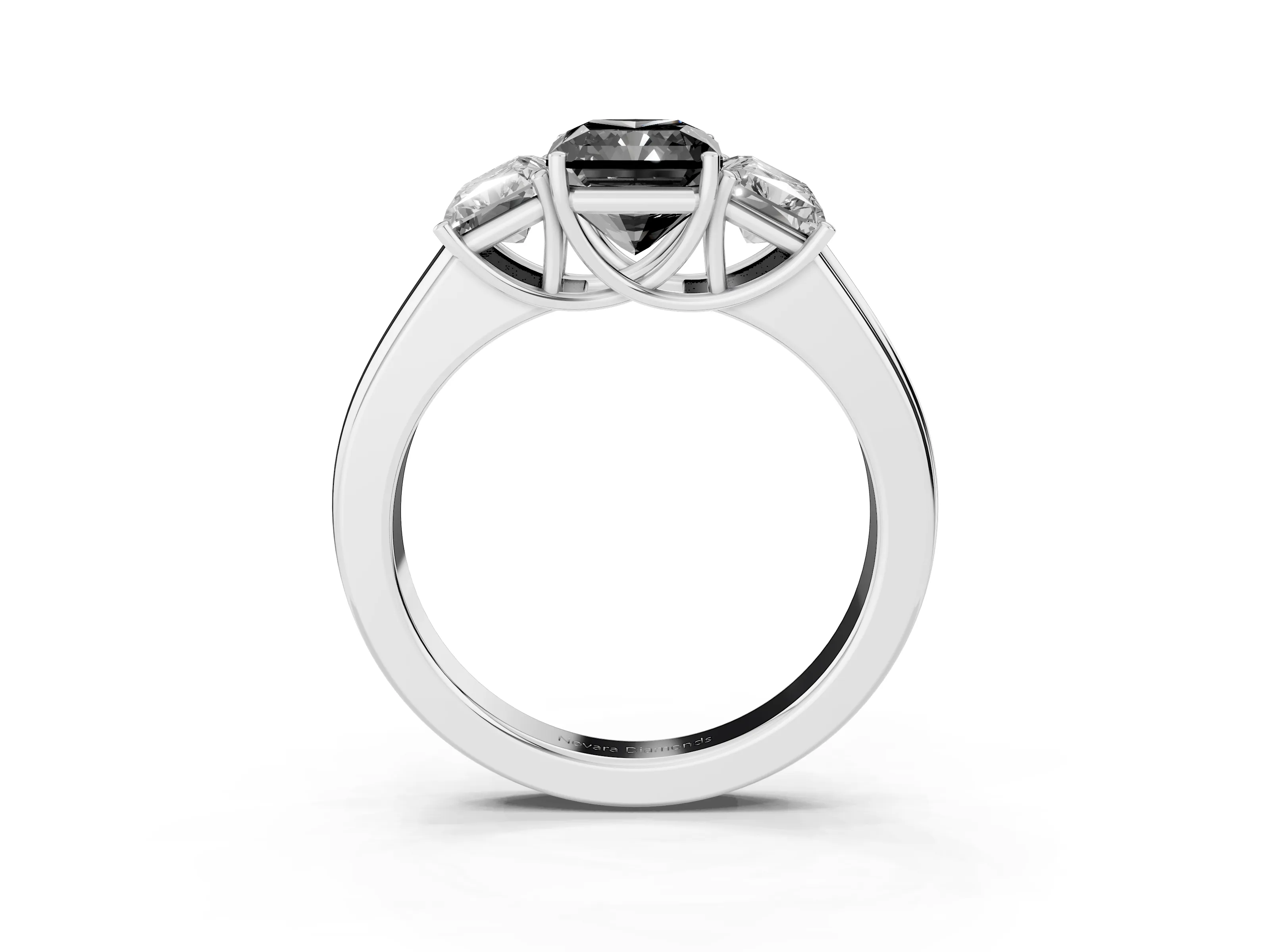 Fancy Black Three-Stone Radiant Cut Diamond Ring Set in Silver with Matching Prong Settings and Plain Band