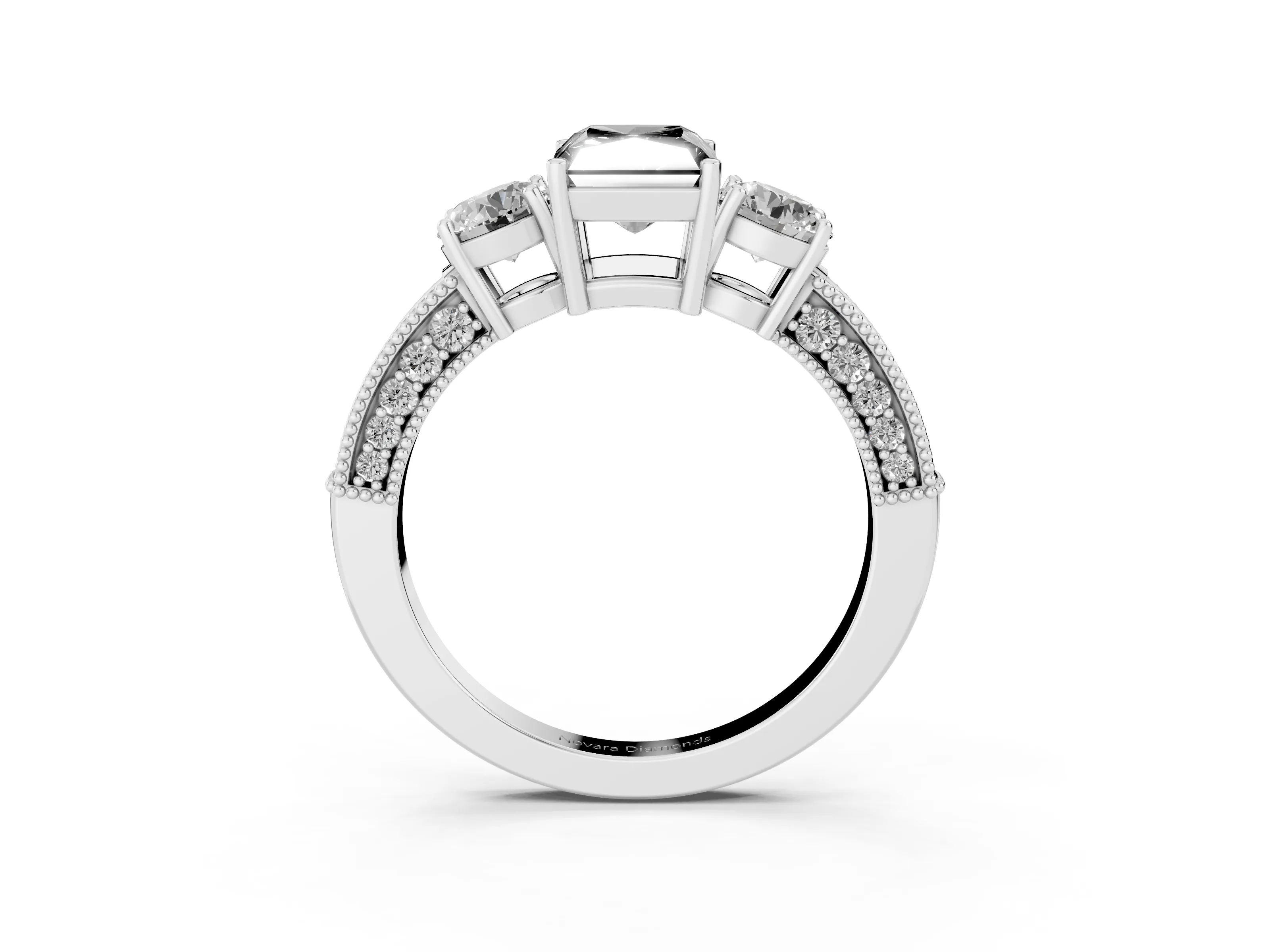 Fancy Black Radiant Cut Diamond Three-Stone Ring Set in Platinum with Round Side Stones and Pavé Band