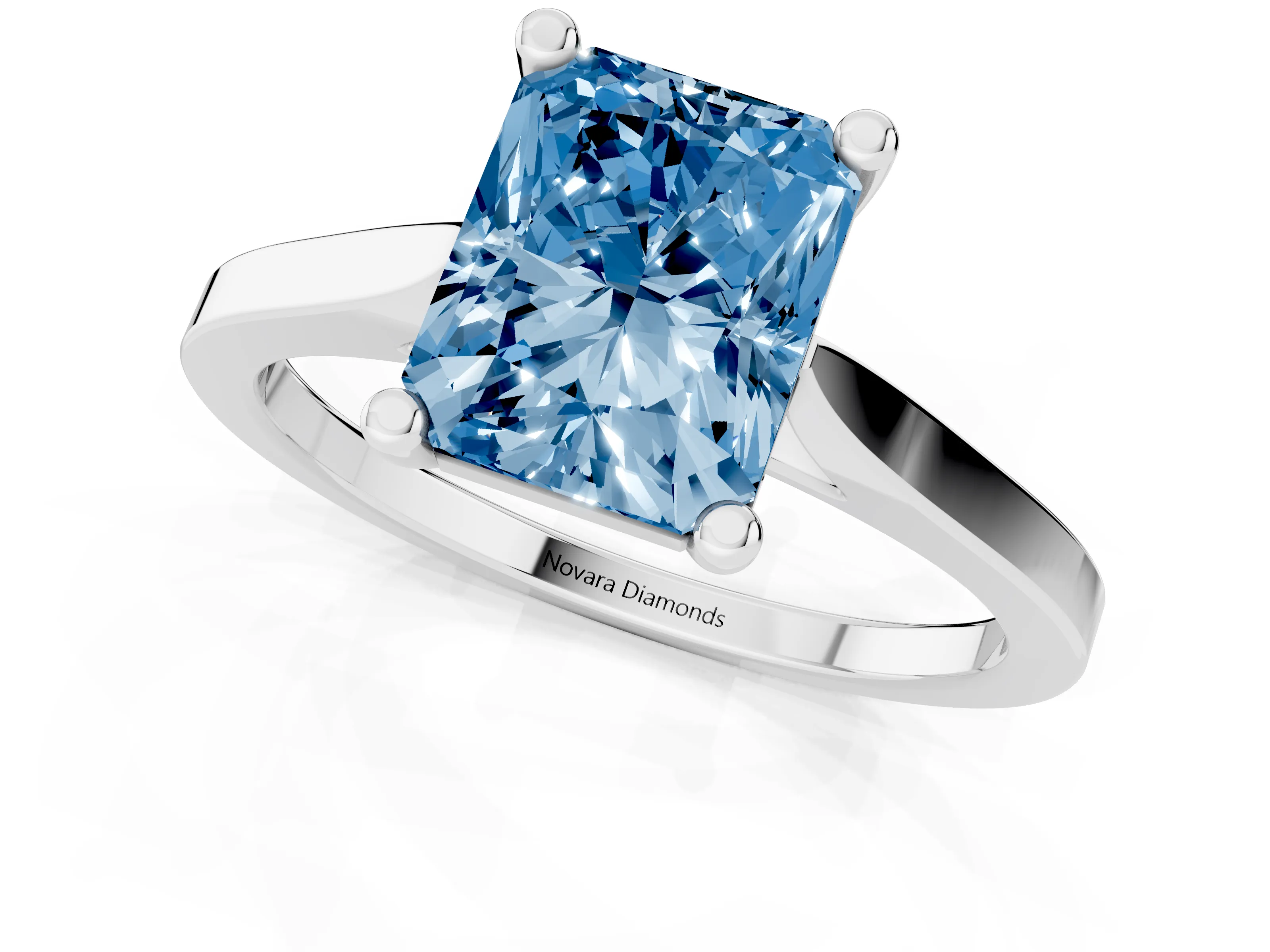 Fancy Blue Radiant Cut Diamond Solitaire Ring Set in White gold with Prong Setting and Tapered Band