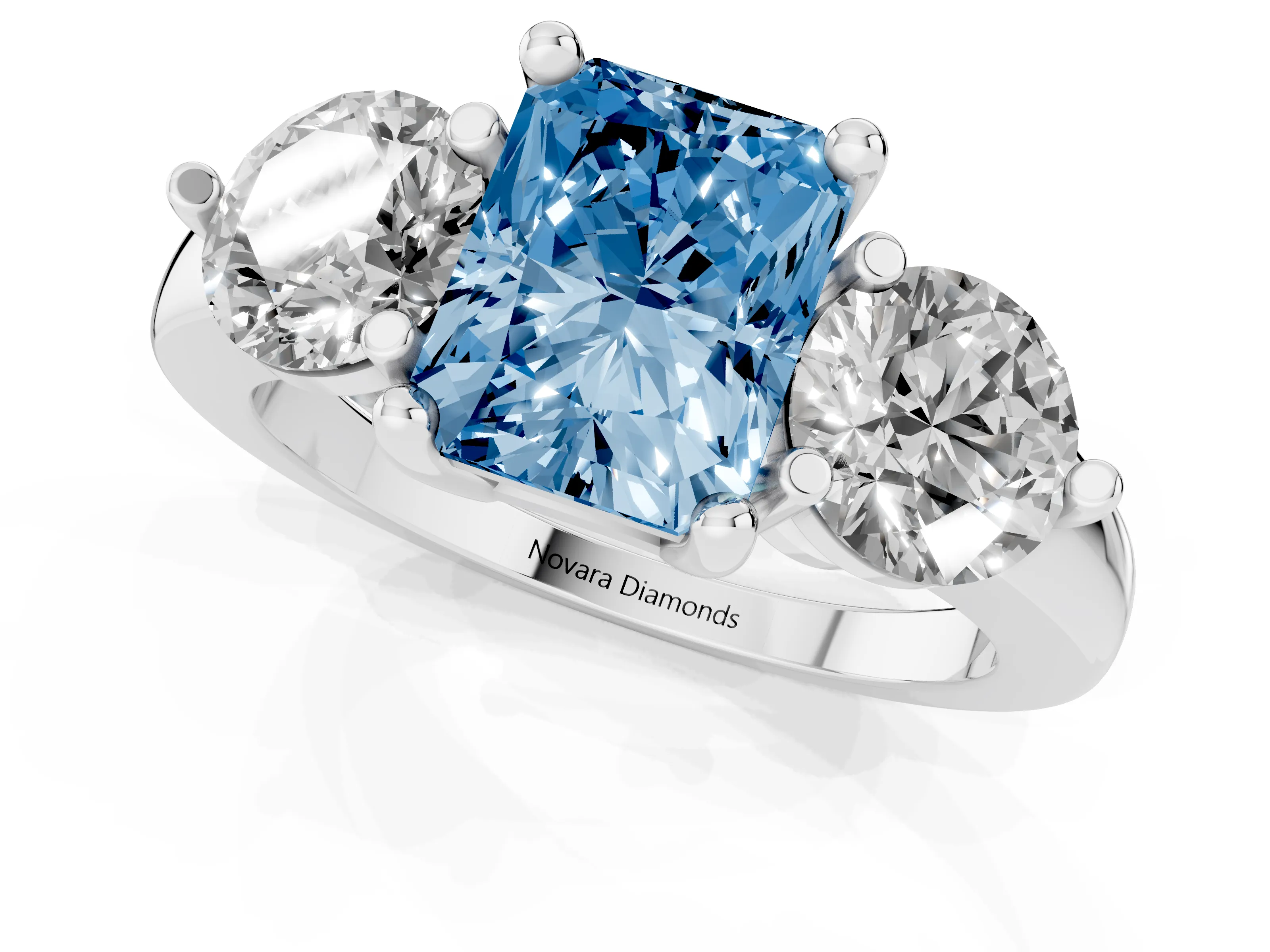 Fancy Blue Radiant Cut Diamond Three-Stone Ring Set in Silver with Prong Setting and Classic Band