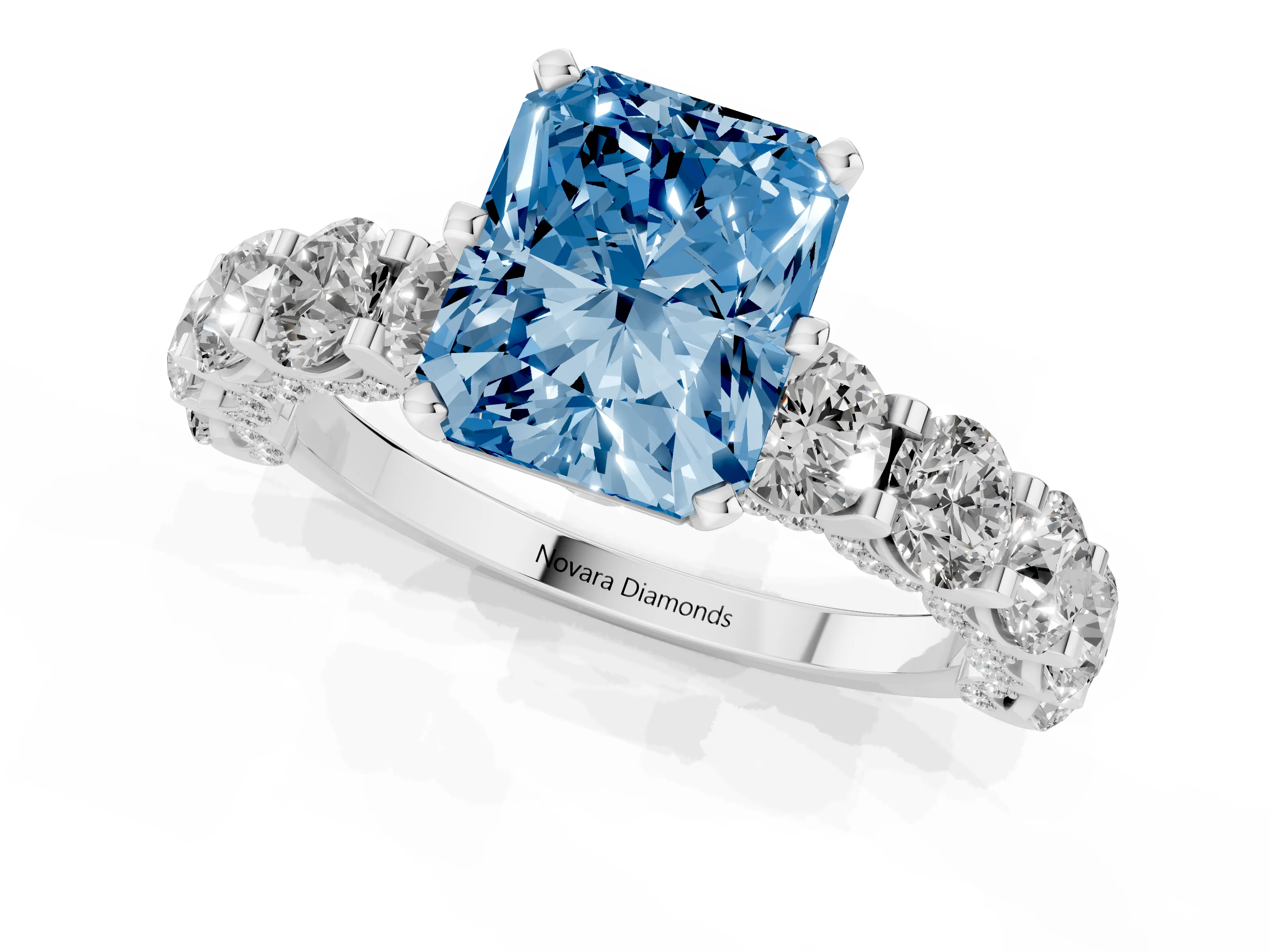 Fancy Blue Radiant Cut Diamond Side Stone Ring Set in Platinum with Alternating Round and Oval Side Stones – second view