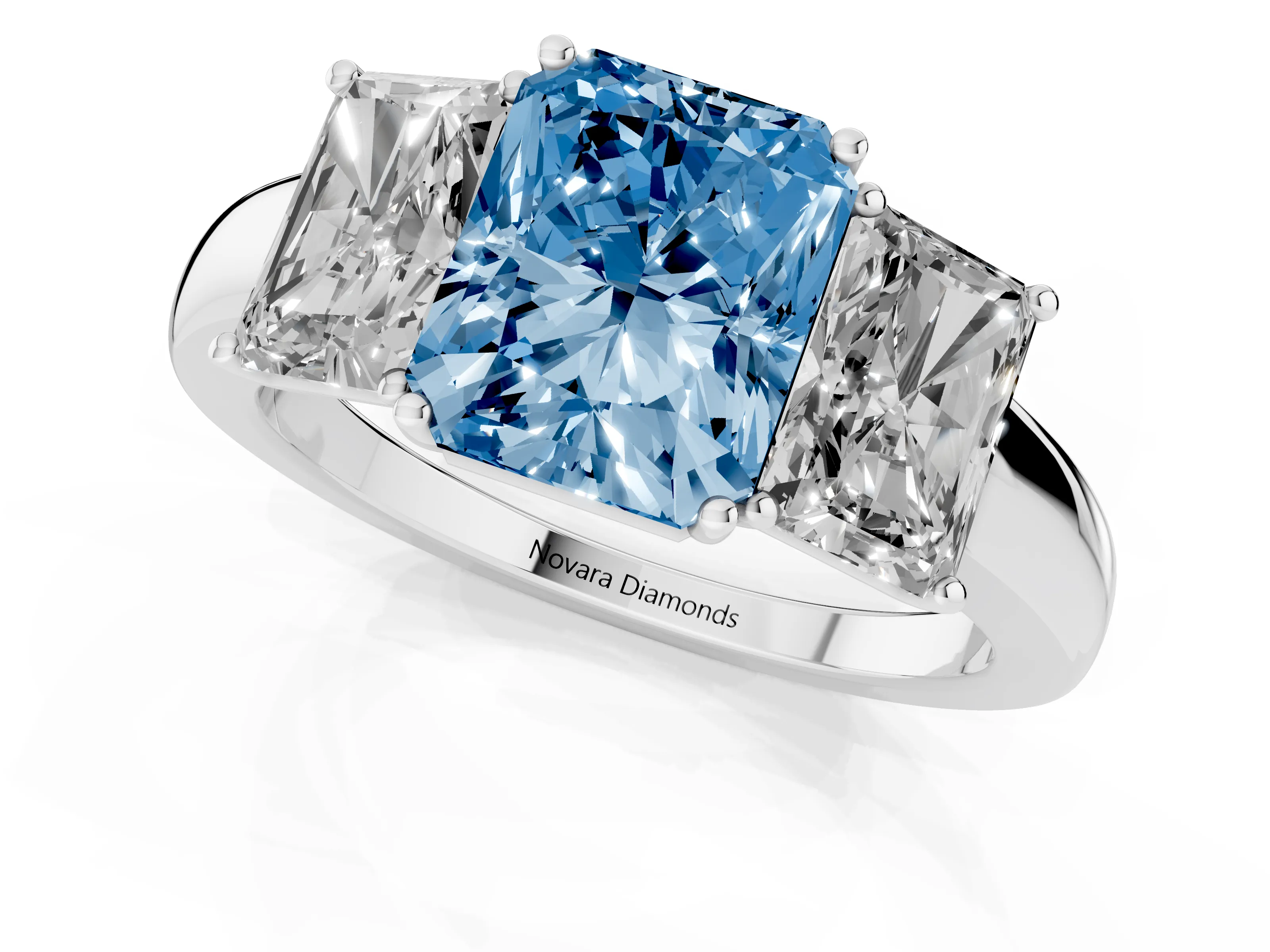 Fancy Blue Radiant Cut Diamond Three-Stone Ring Set in Platinum with Bold Center and Classic Band