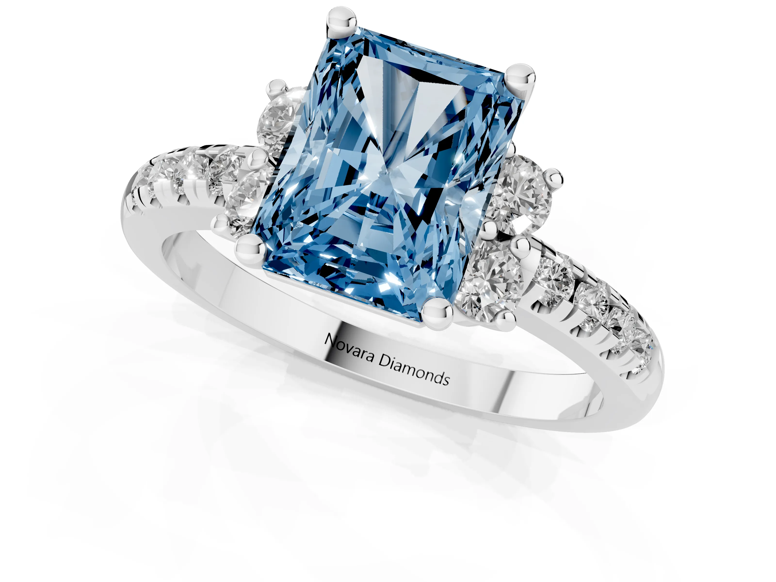 Fancy Blue Radiant Cut Diamond Three-Stone Pavé Ring Set in Silver with Prong Setting