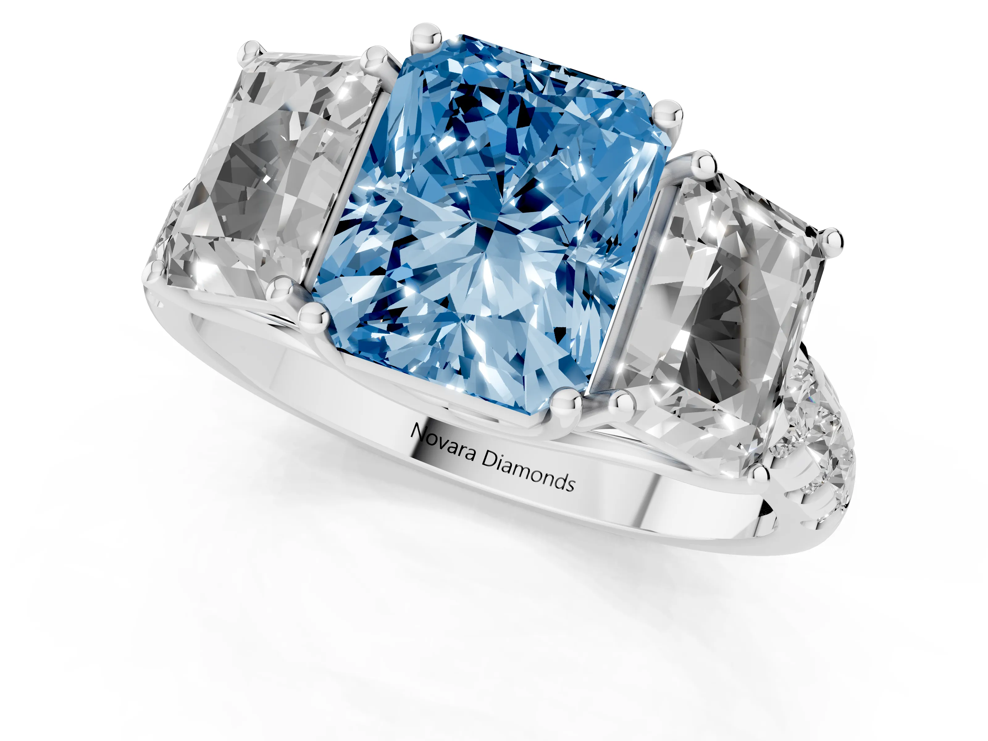 Fancy Blue Radiant Cut Diamond Three-Stone Ring Set in Platinum with Pavé Band