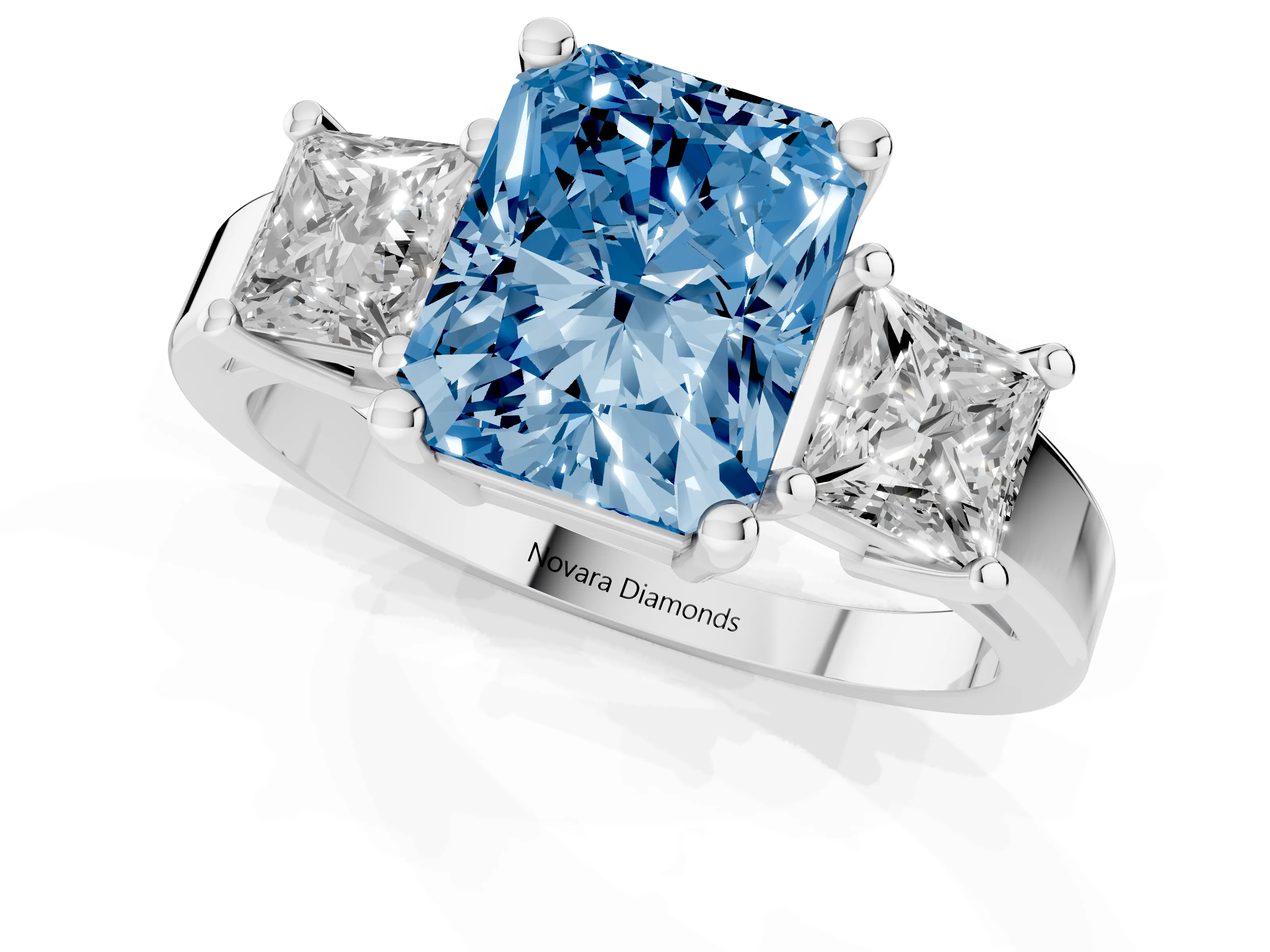 Fancy Blue Three-Stone Radiant Cut Diamond Solitaire Ring Set in Platinum with Prong Setting