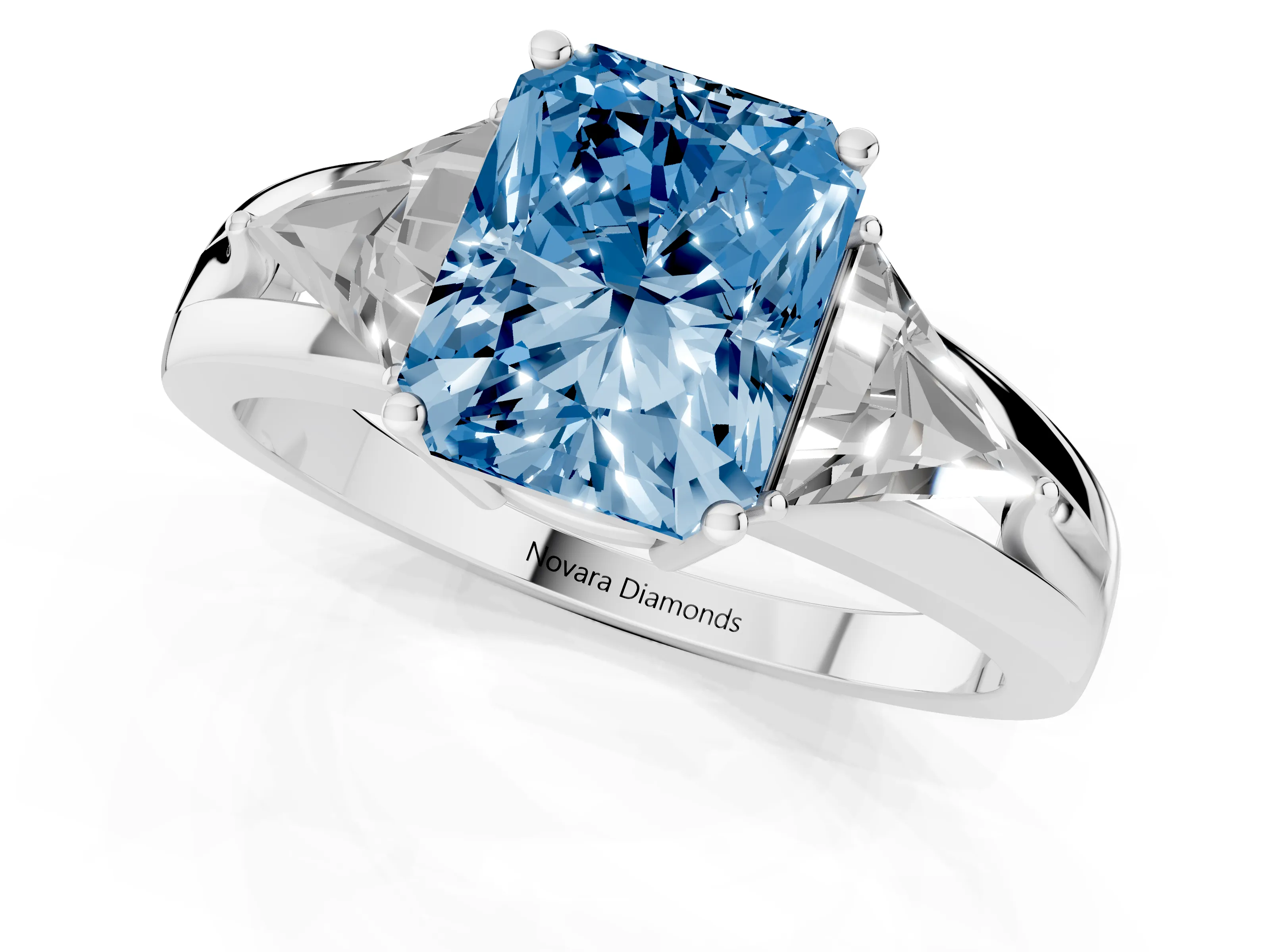 Fancy Blue Radiant Cut Diamond Three-Stone Ring Set in Silver with Trillion Side Stones and Split Shank