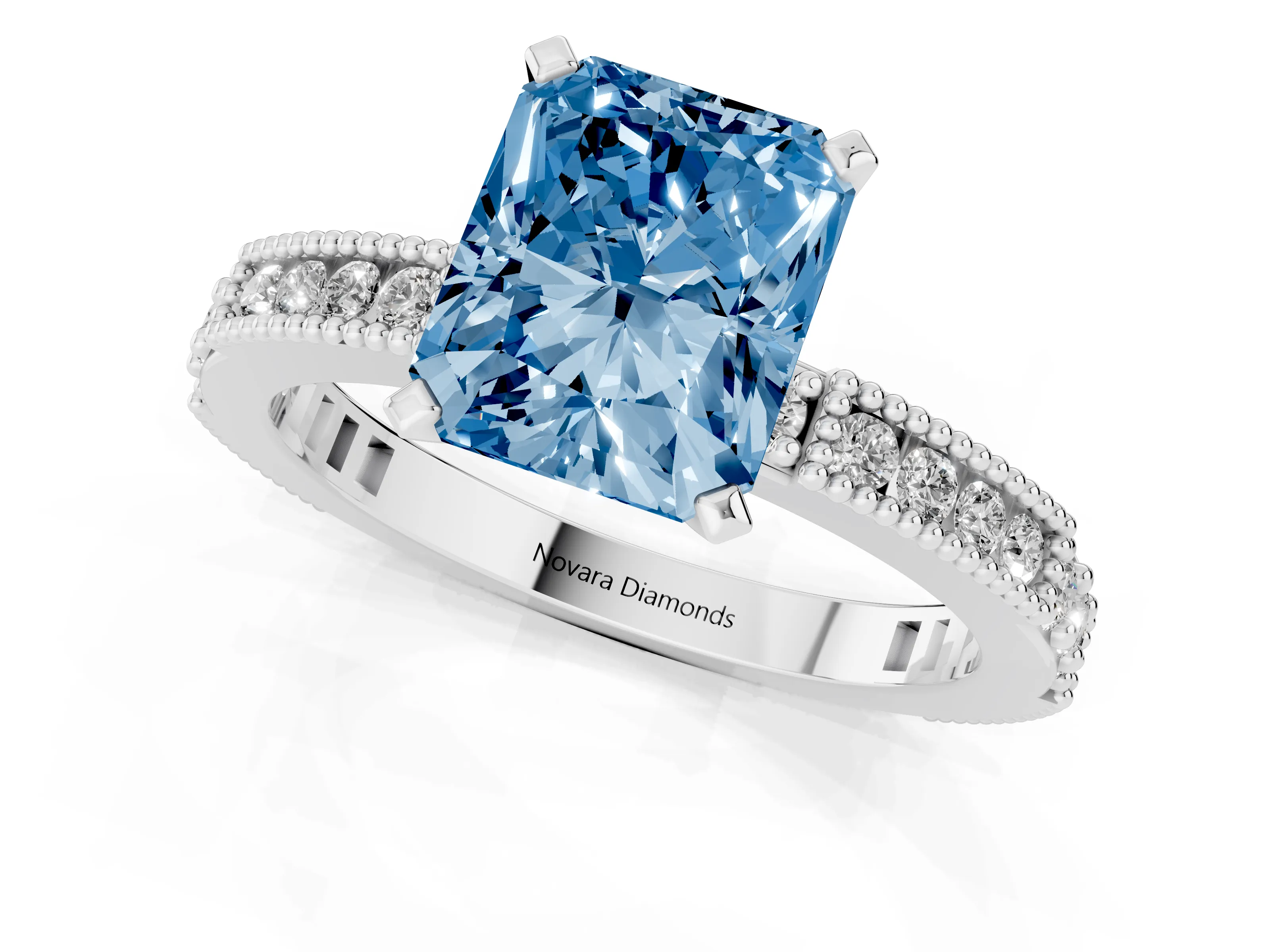 Fancy Blue Radiant Cut Diamond Solitaire Ring Set in White gold with Slim Pavé Band and Prong Setting