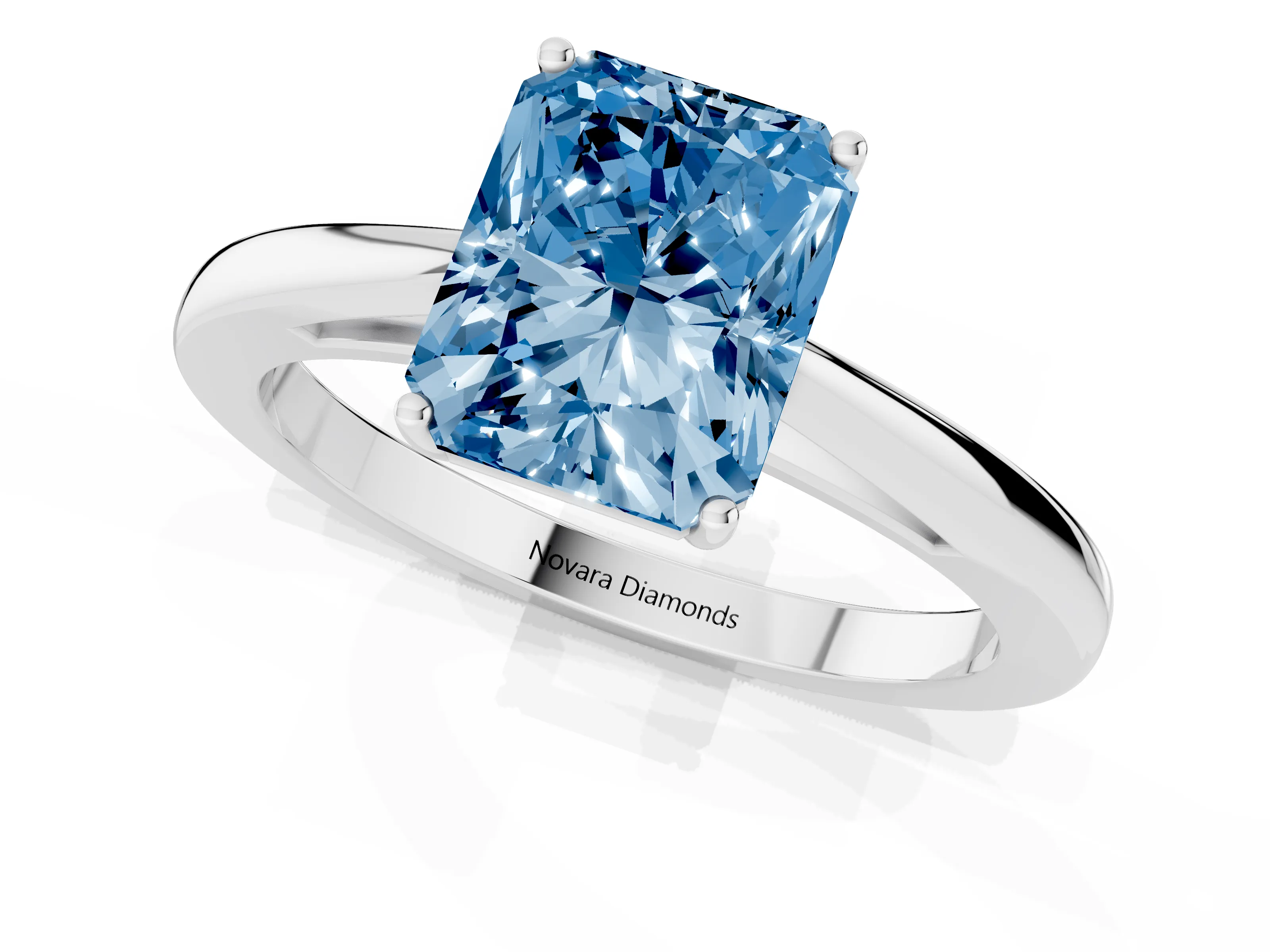 Fancy Blue Radiant Cut Diamond Solitaire Ring Set in Silver with Split Shank and Prong Setting