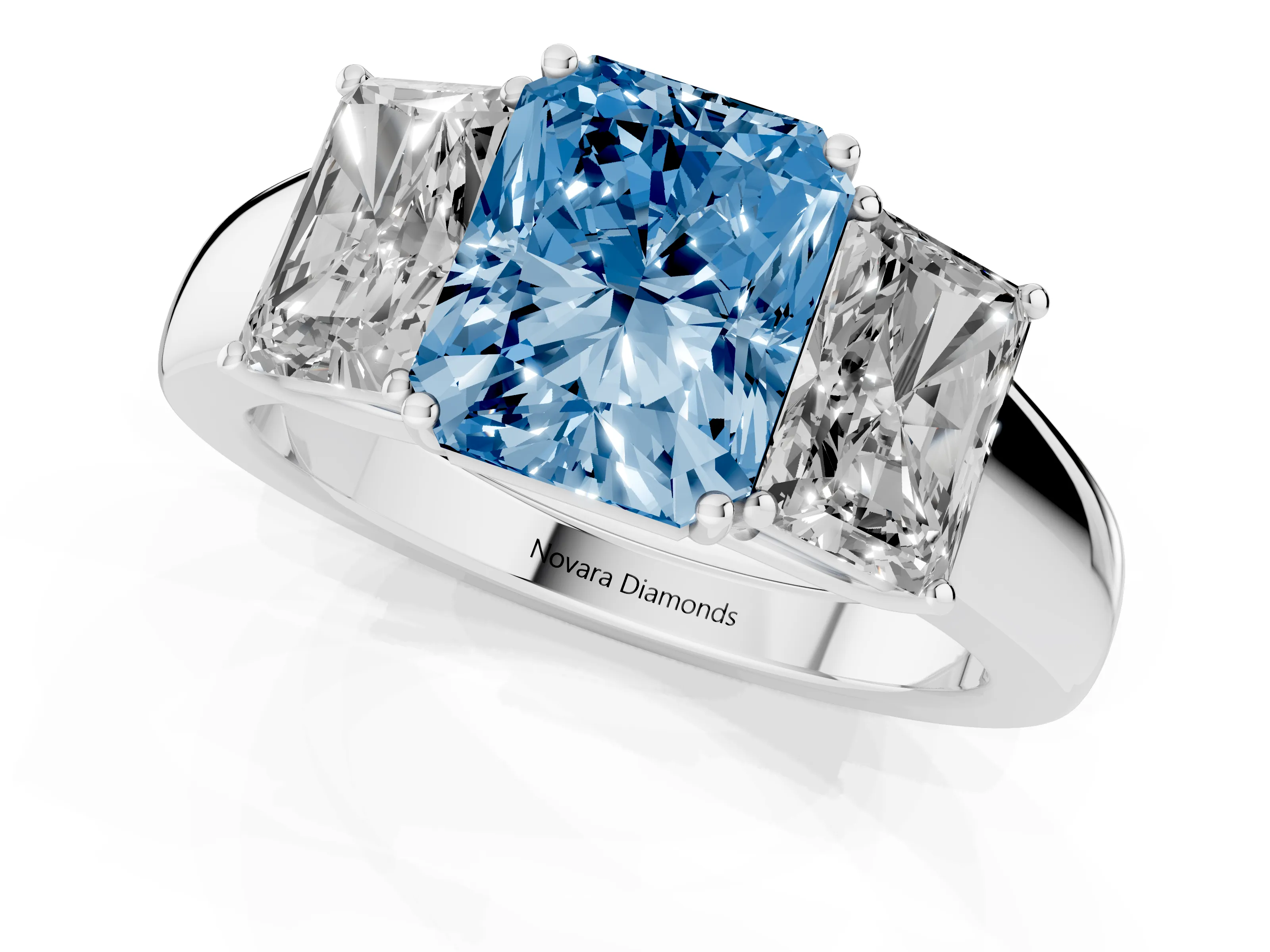 Fancy Blue Three-Stone Radiant Cut Diamond Ring Set in Silver with Matching Prong Settings and Plain Band