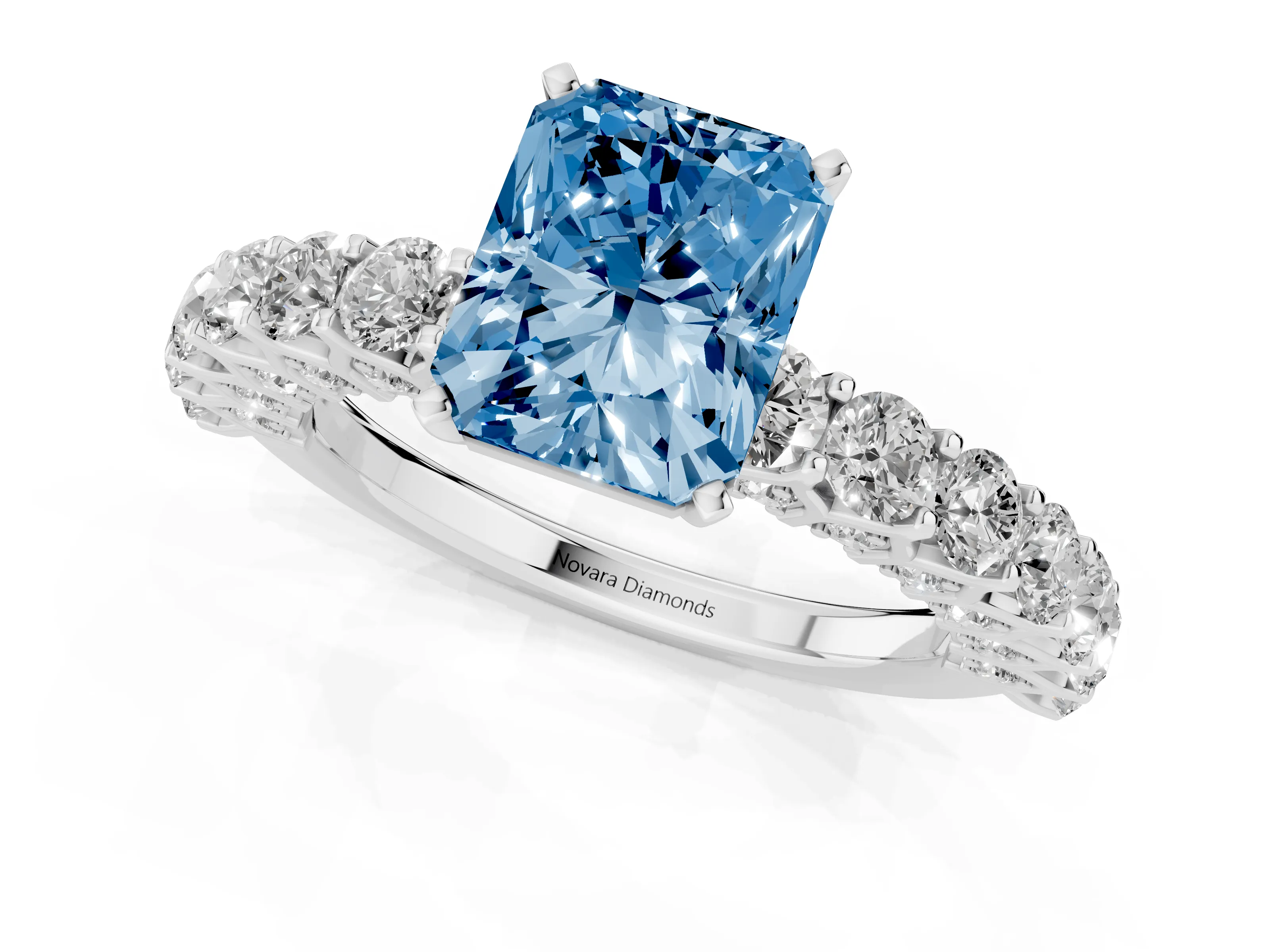 Fancy Blue Radiant Cut Diamond Solitaire Ring Set in Platinum with Shared Prong Pavé Band