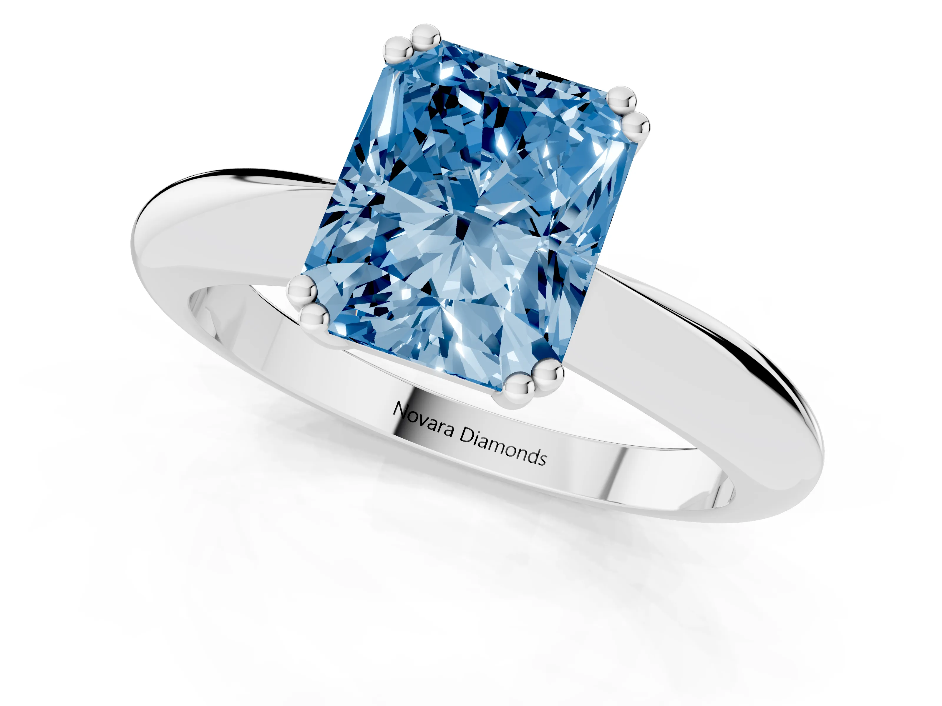 Fancy Blue Radiant Cut Diamond Solitaire Engagement Ring Set in Silver with Tapered Band and Prong Setting