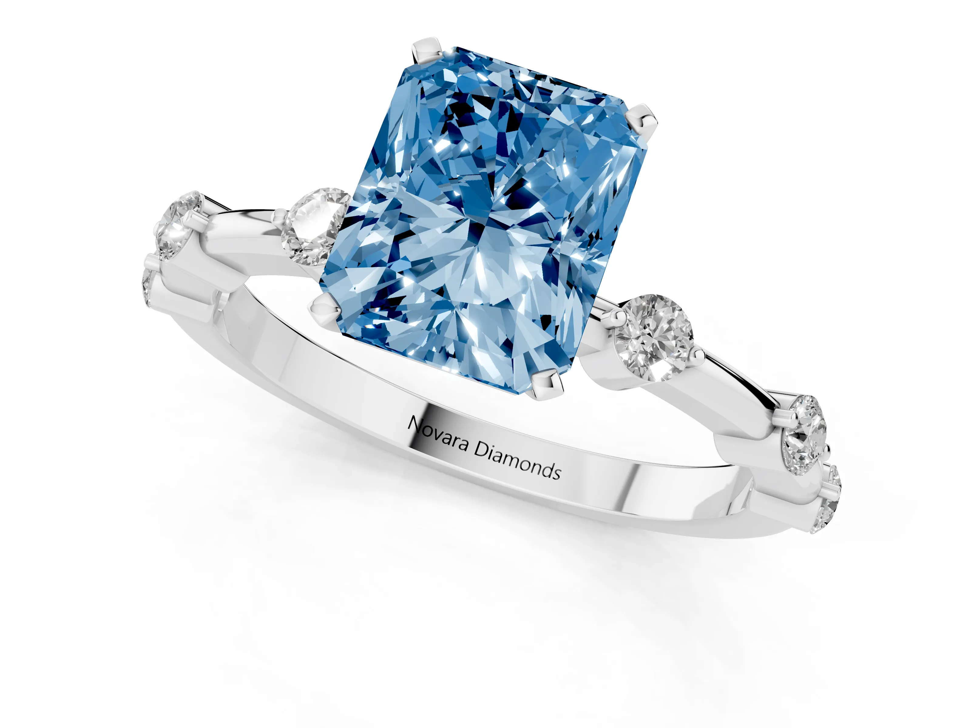 Fancy Blue Radiant Cut Diamond Solitaire Ring Set in Silver with Bezel Set Side Stones and Prong Setting