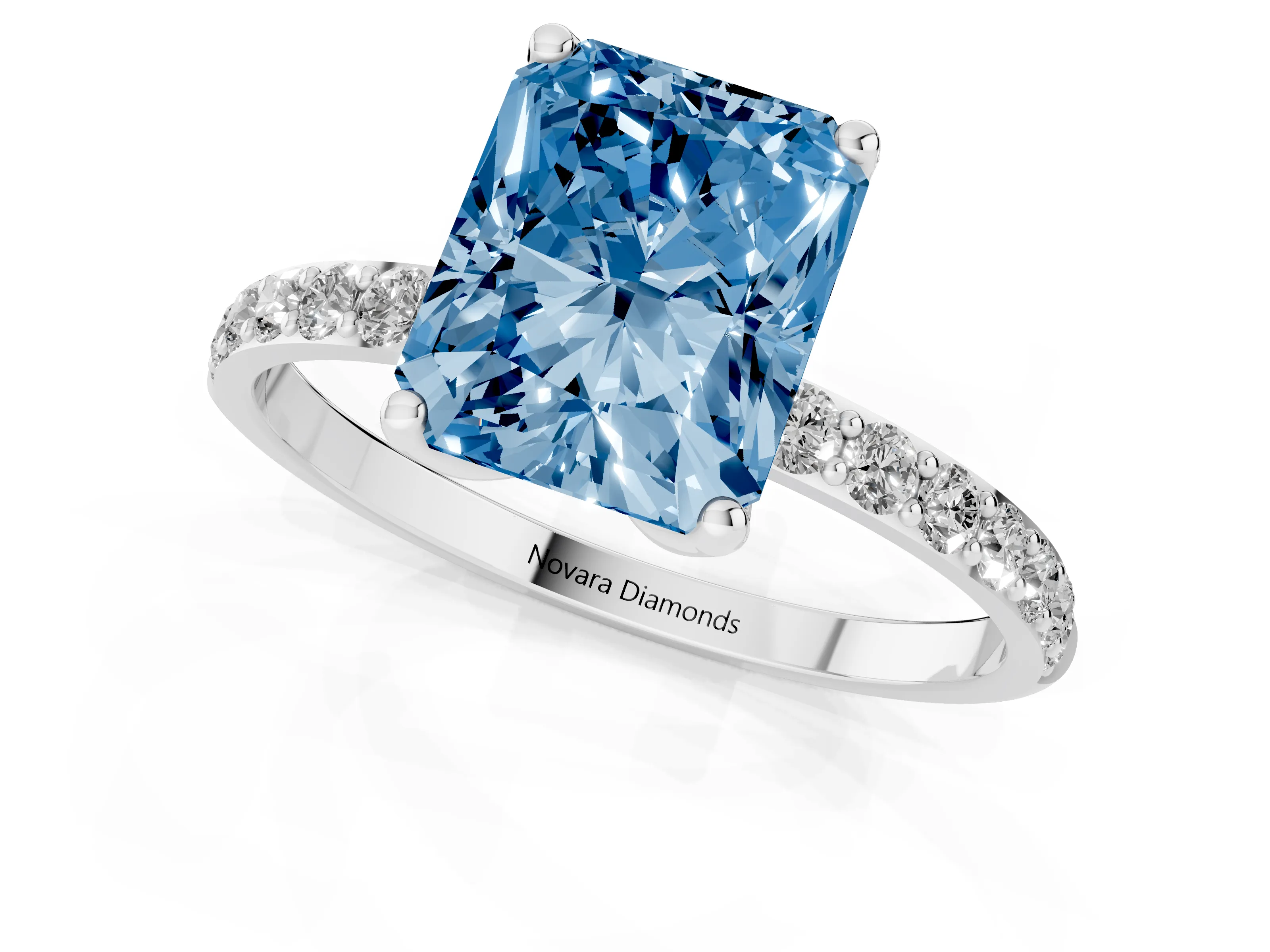 Fancy Blue Radiant Cut Diamond Solitaire Engagement Ring Set in White gold with Round Pavé Band and Prong Setting