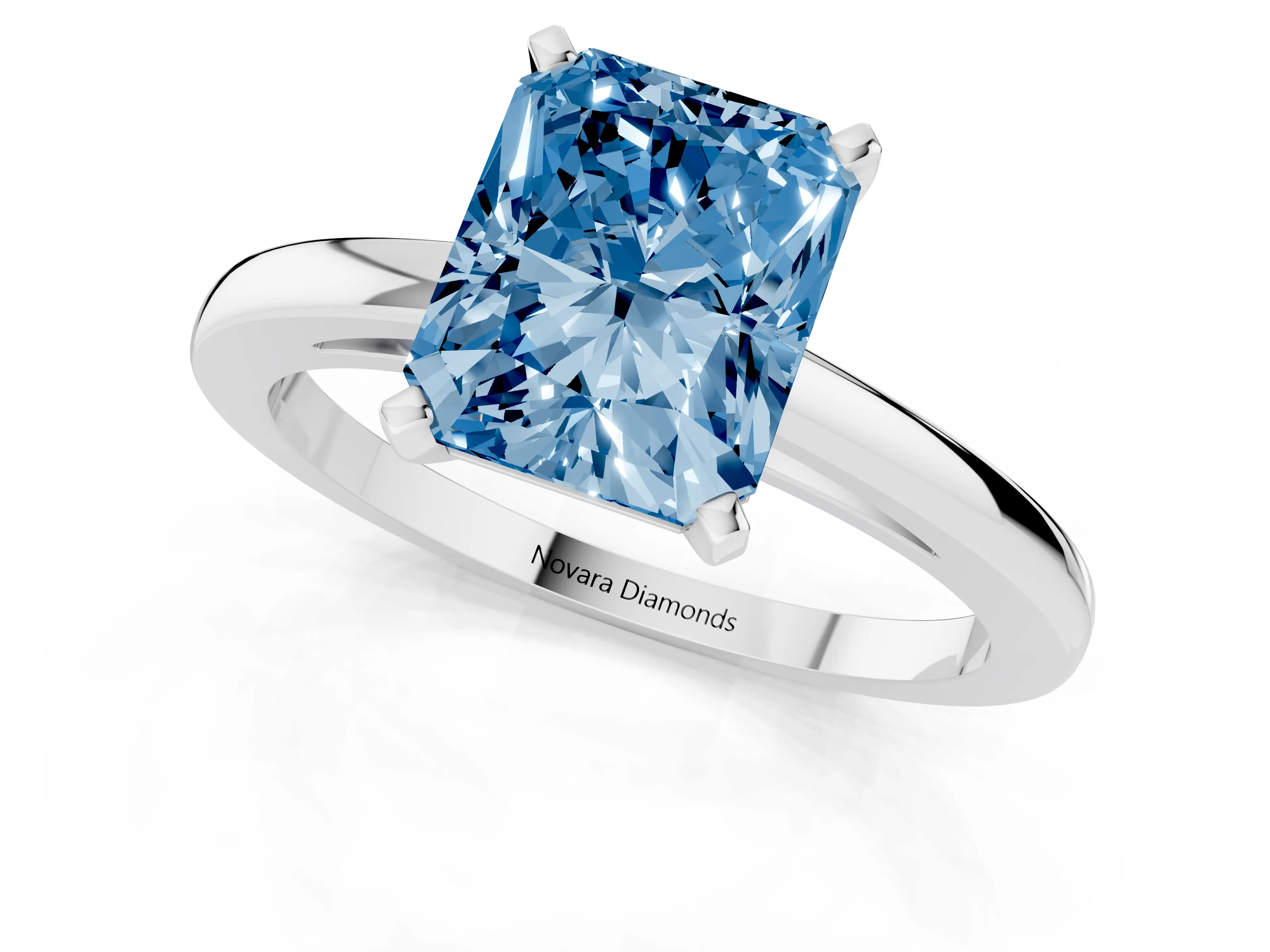 Fancy Blue Radiant Cut Diamond Solitaire Engagement Ring Set in Platinum with Prong Setting on a Classic Band