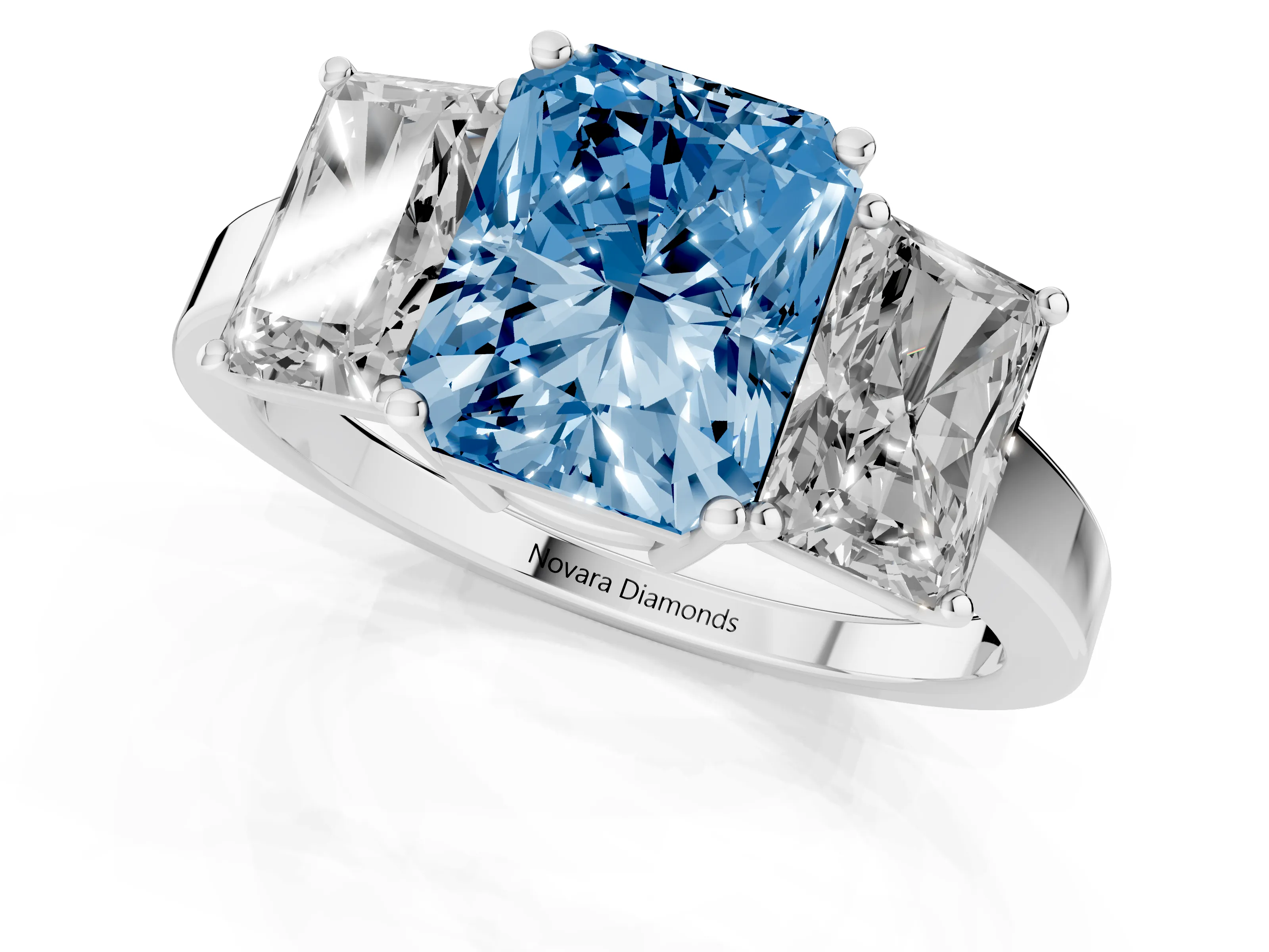 Fancy Blue Radiant Cut Diamond Three-Stone Engagement Ring Set in White gold with Flat Band