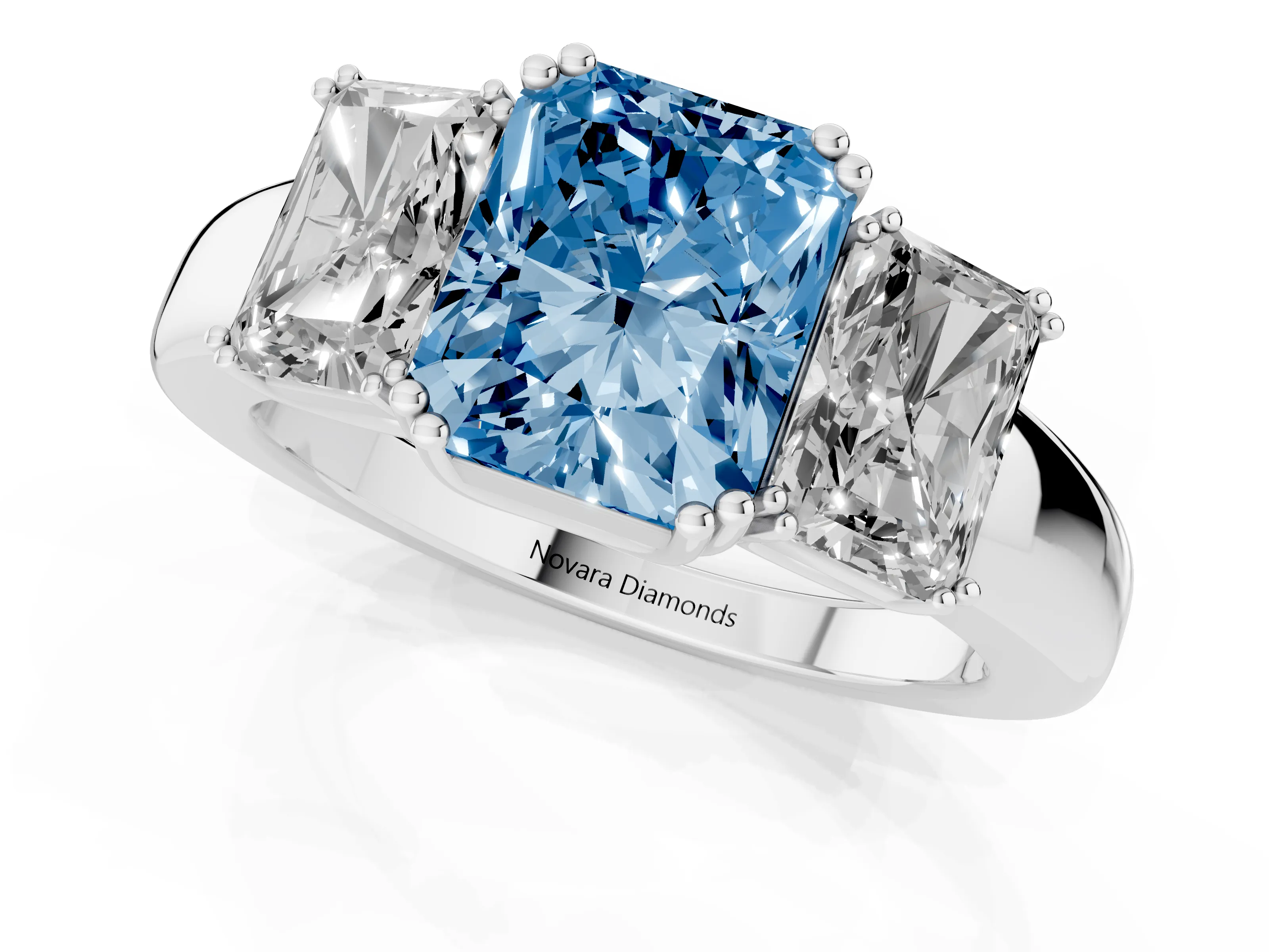 Fancy Blue Radiant Cut Diamond Three-Stone Ring Set in Platinum with Polished Channel-Set Band