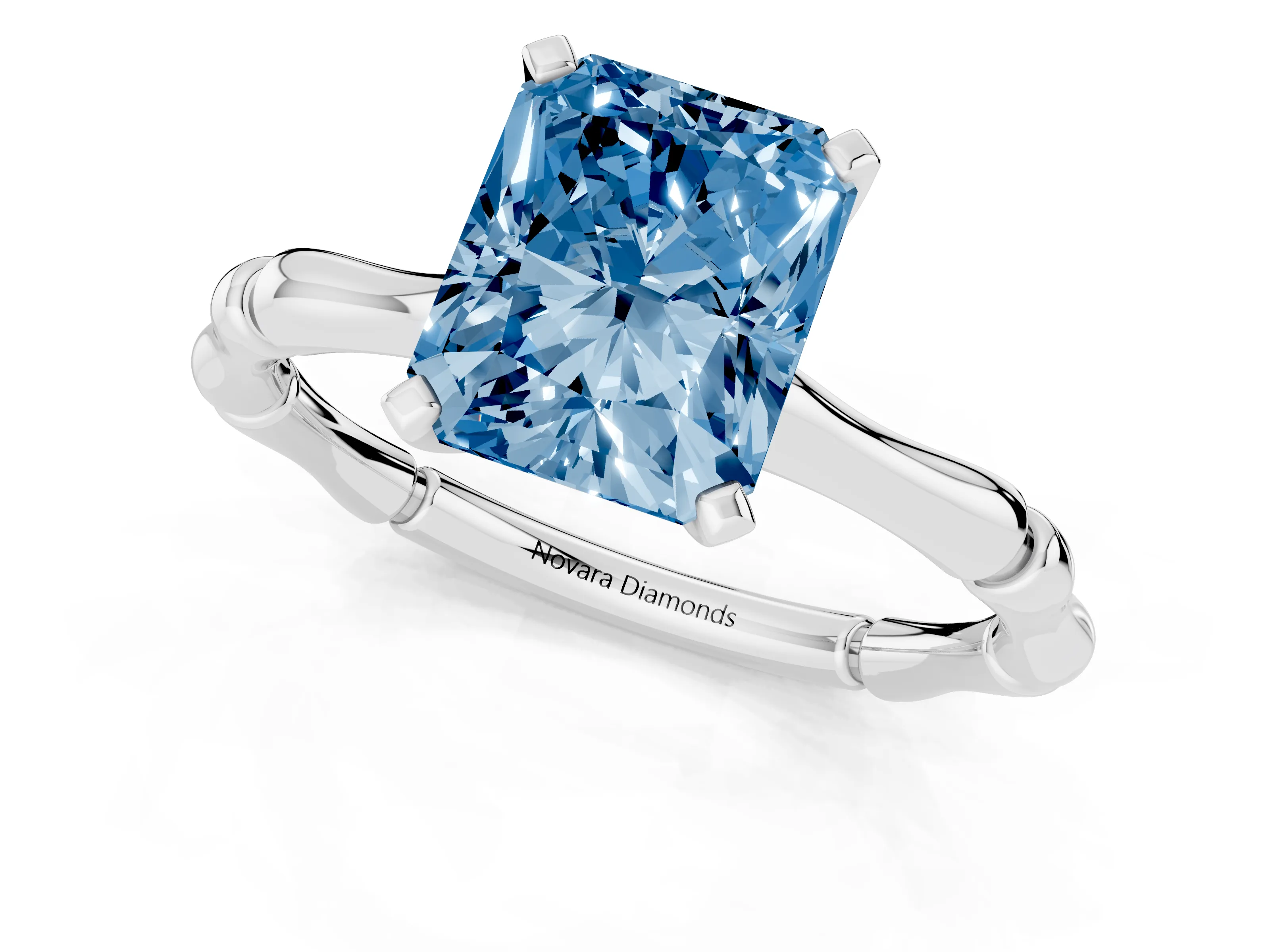 Fancy Blue Radiant Cut Diamond Solitaire Ring Set in White gold with Bamboo Band and Prong Setting