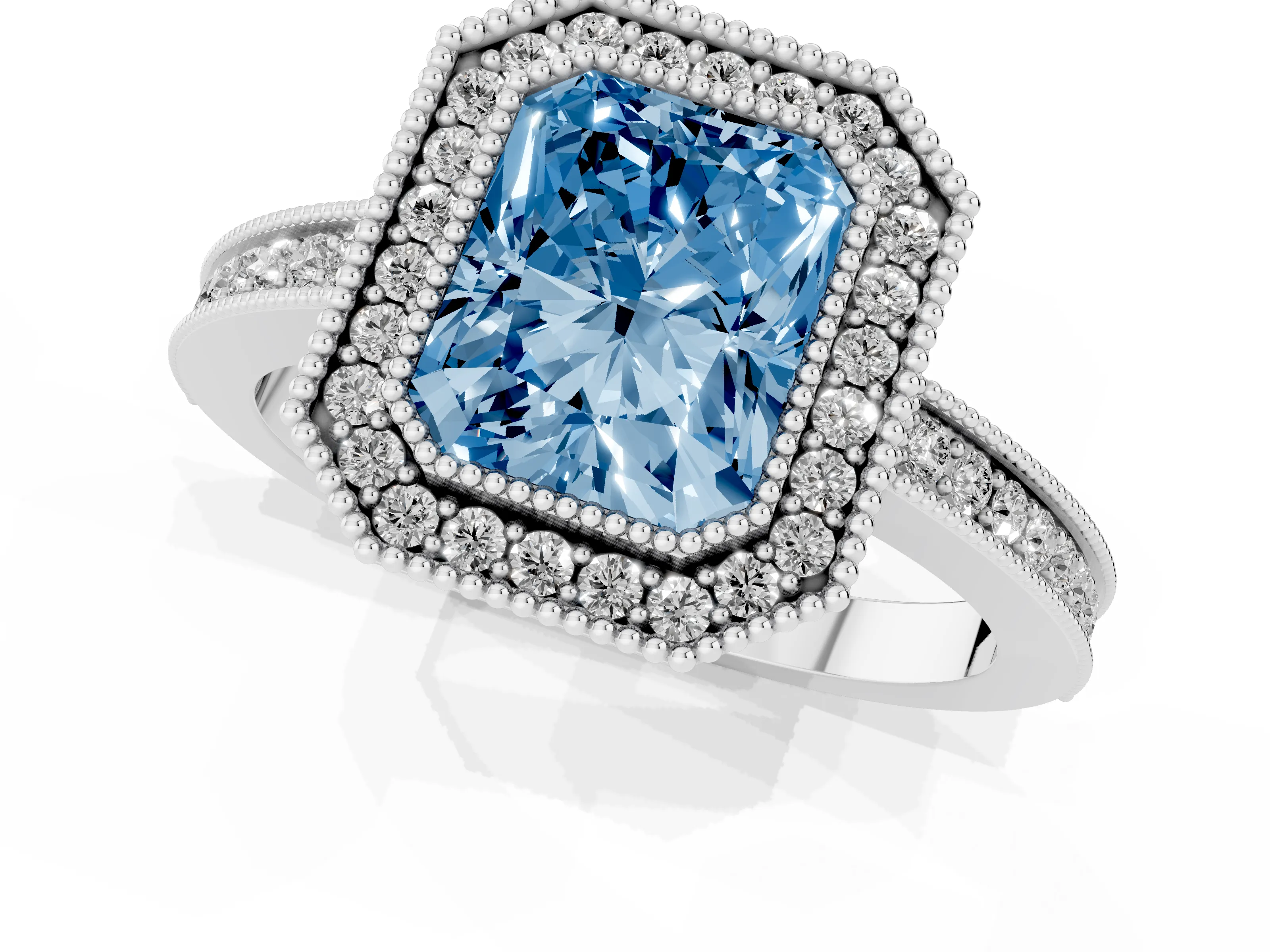 Fancy Blue Radiant Cut Diamond Halo Ring Set in White gold with Pavé Band and Milgrain-Edged Prongs