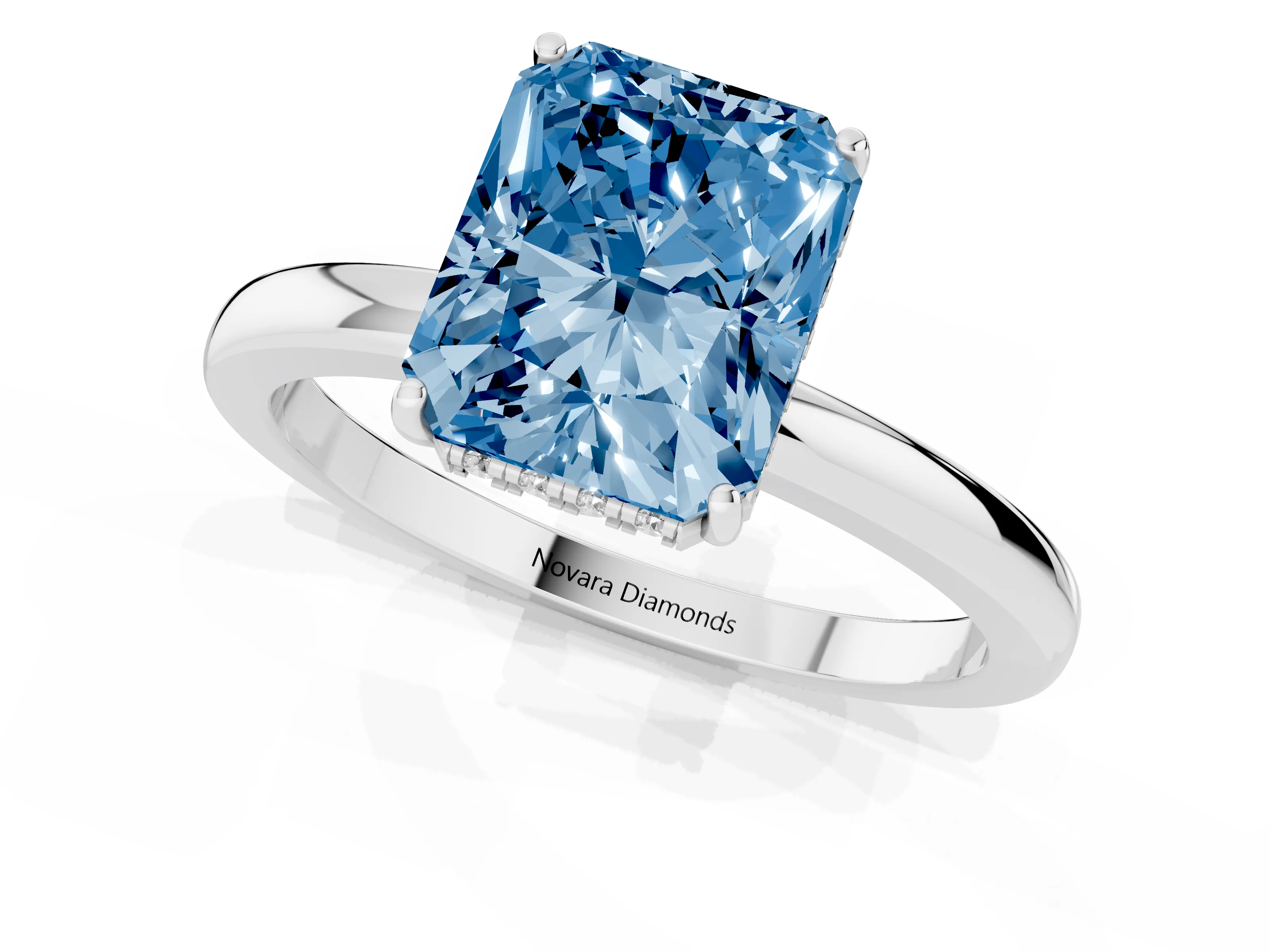 Fancy Blue Radiant Cut Diamond Solitaire Ring Set in White gold with Plain Band and Prong Setting