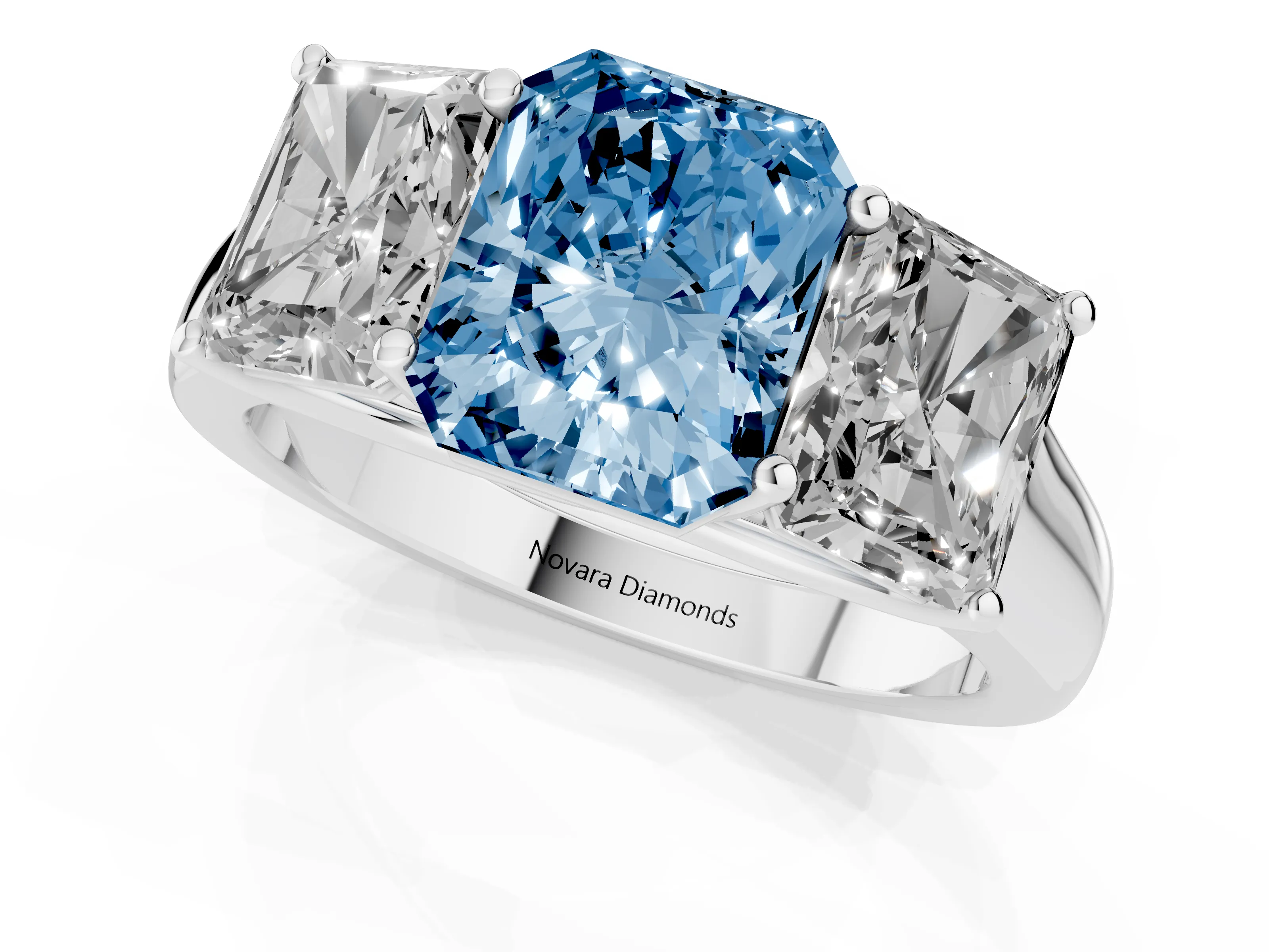 Fancy Blue Radiant Cut Diamond Three-Stone Ring Set in White gold with Plain Polished Band