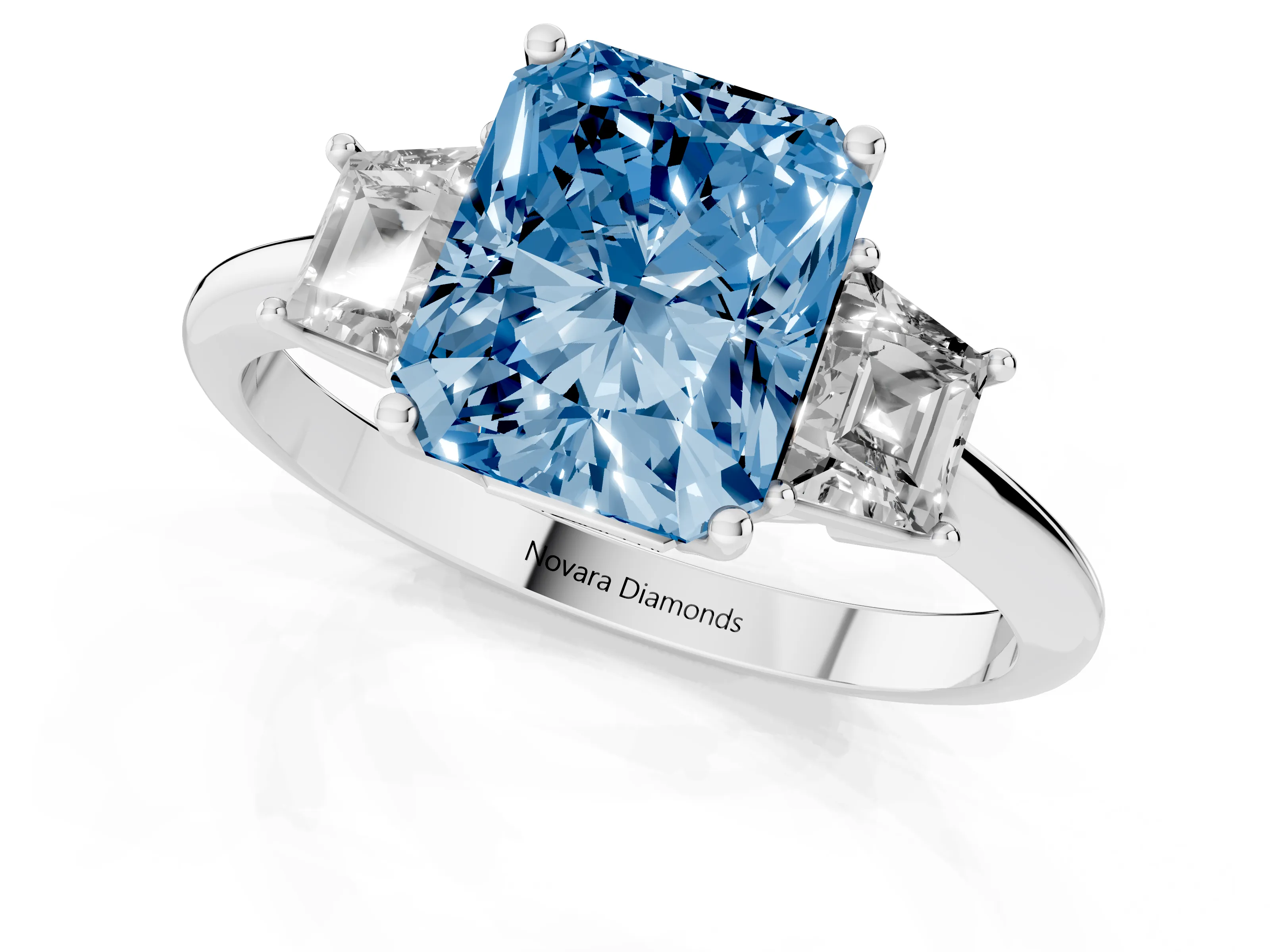 Fancy Blue Radiant Cut Diamond Three-Stone Ring Set in Silver with Trapezoid Side Stones and Prong Setting