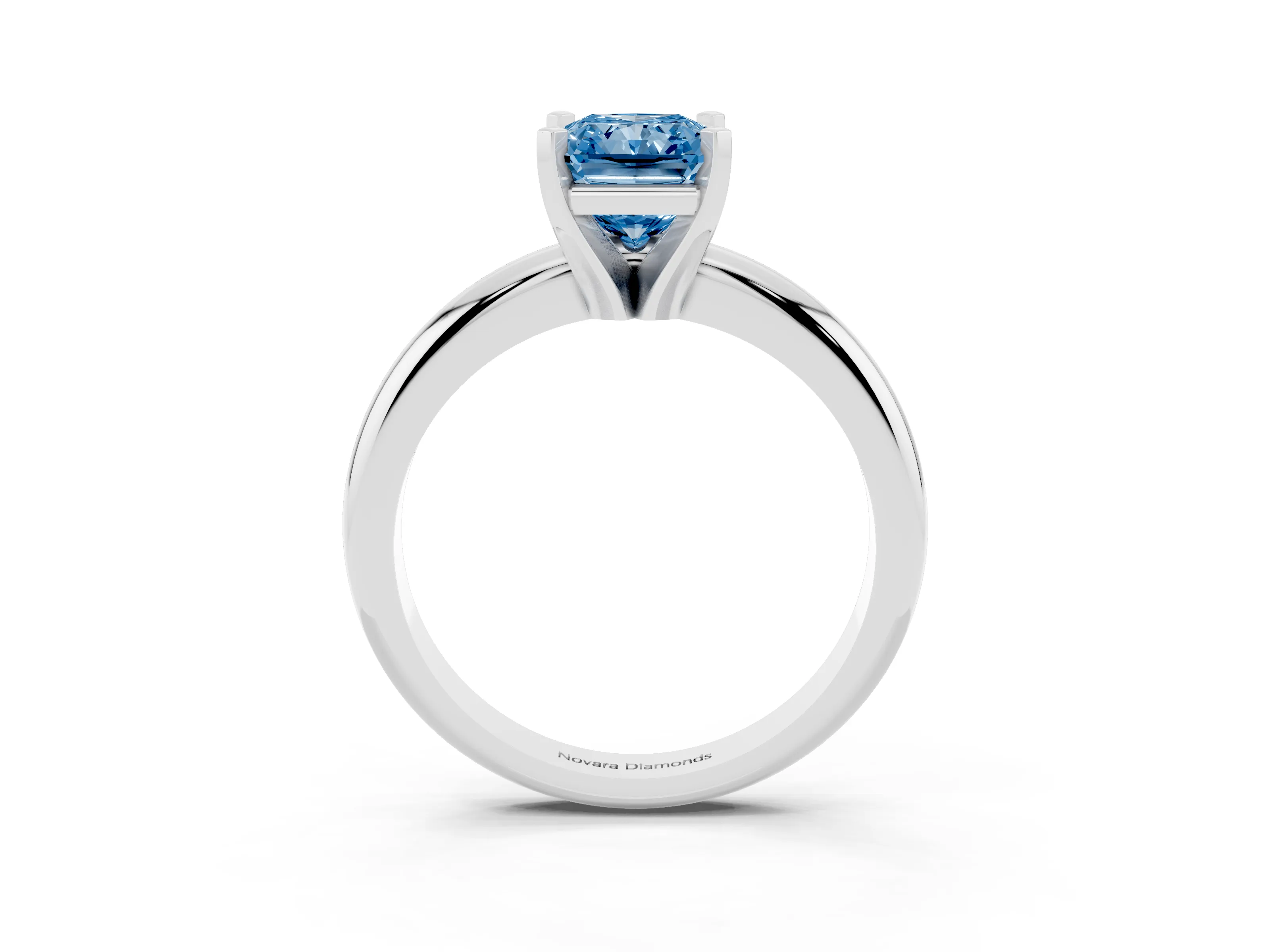 Fancy Blue Radiant Cut Diamond Solitaire Engagement Ring Set in Platinum with Round Band and Prong Setting