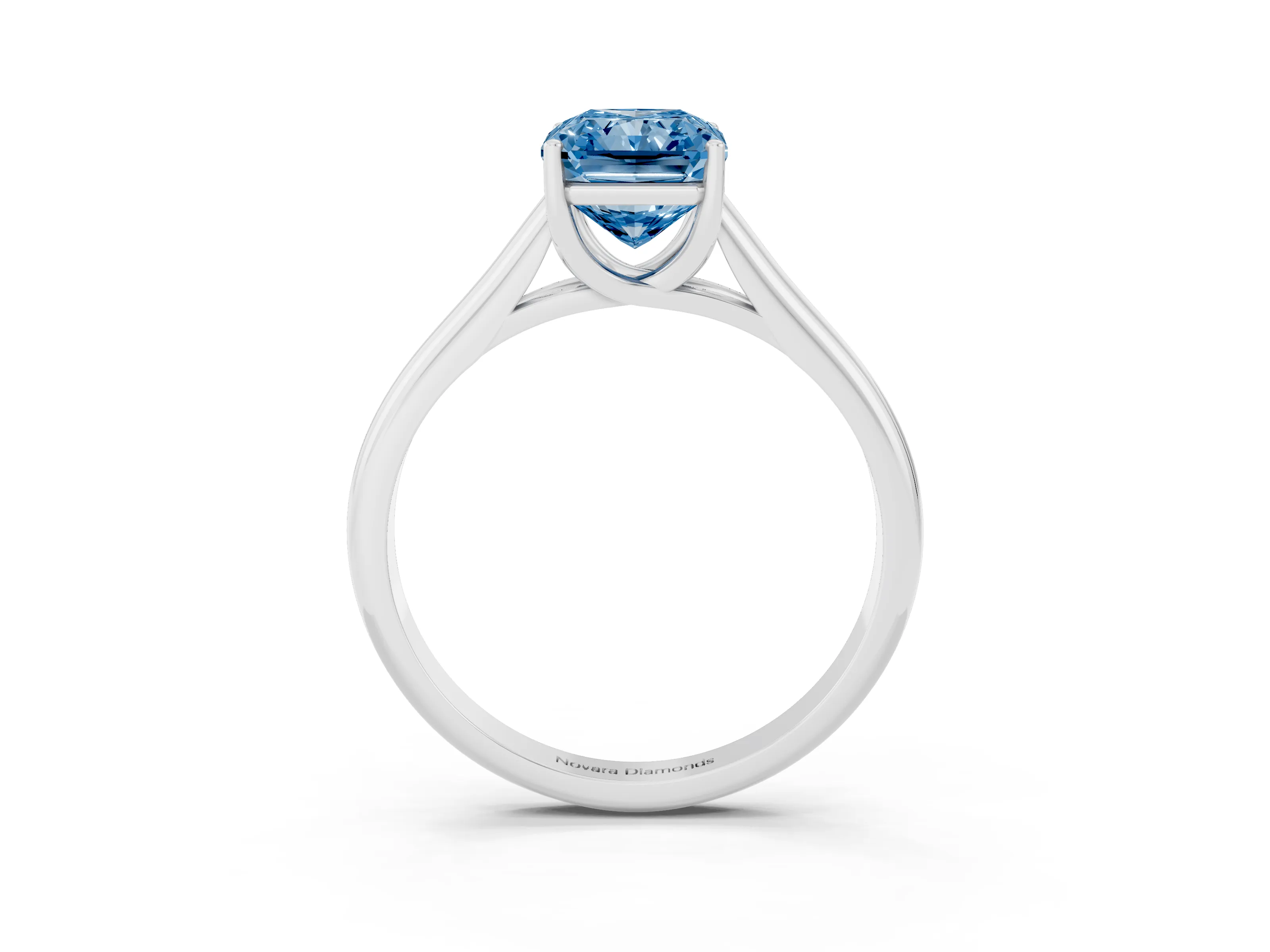 Fancy Blue Radiant Cut Diamond Solitaire Engagement Ring Set in Silver with Subtly Tapered Band and Prong Setting