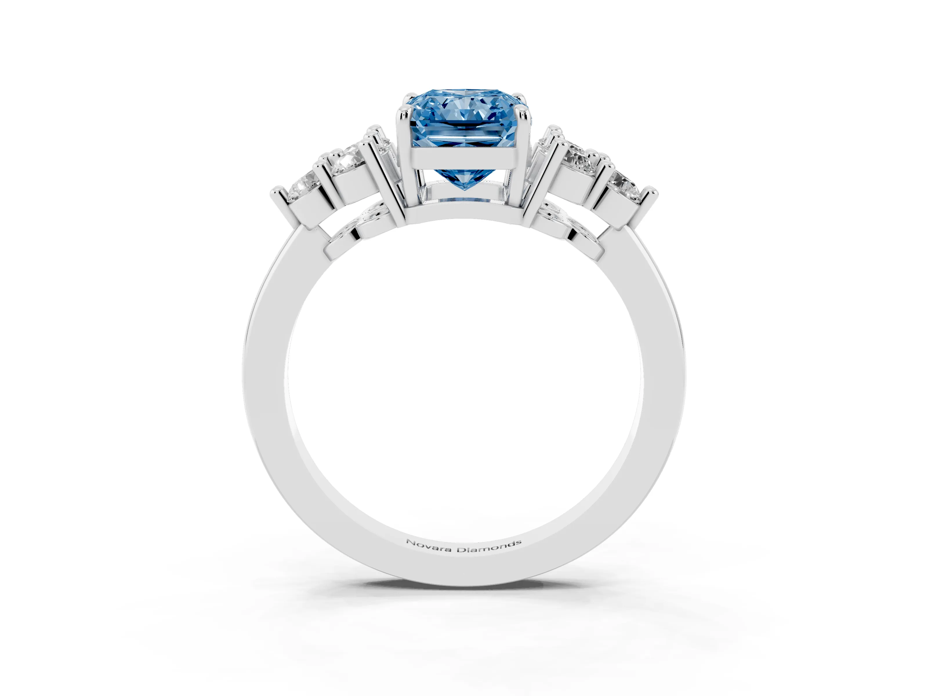 Fancy Blue Radiant Cut Diamond Solitaire Ring Set in White gold with Cluster Accents on Each Side